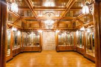 A Mirror inset and Bird's Eye Maple Nashville Jewelry Store Interior 255" W x 223" D x 120.5" — United States, Circa 1913