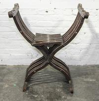 A Continental Mother-of-Pearl Inlaid Savonarola Chair. Height 31 1/2 inches.