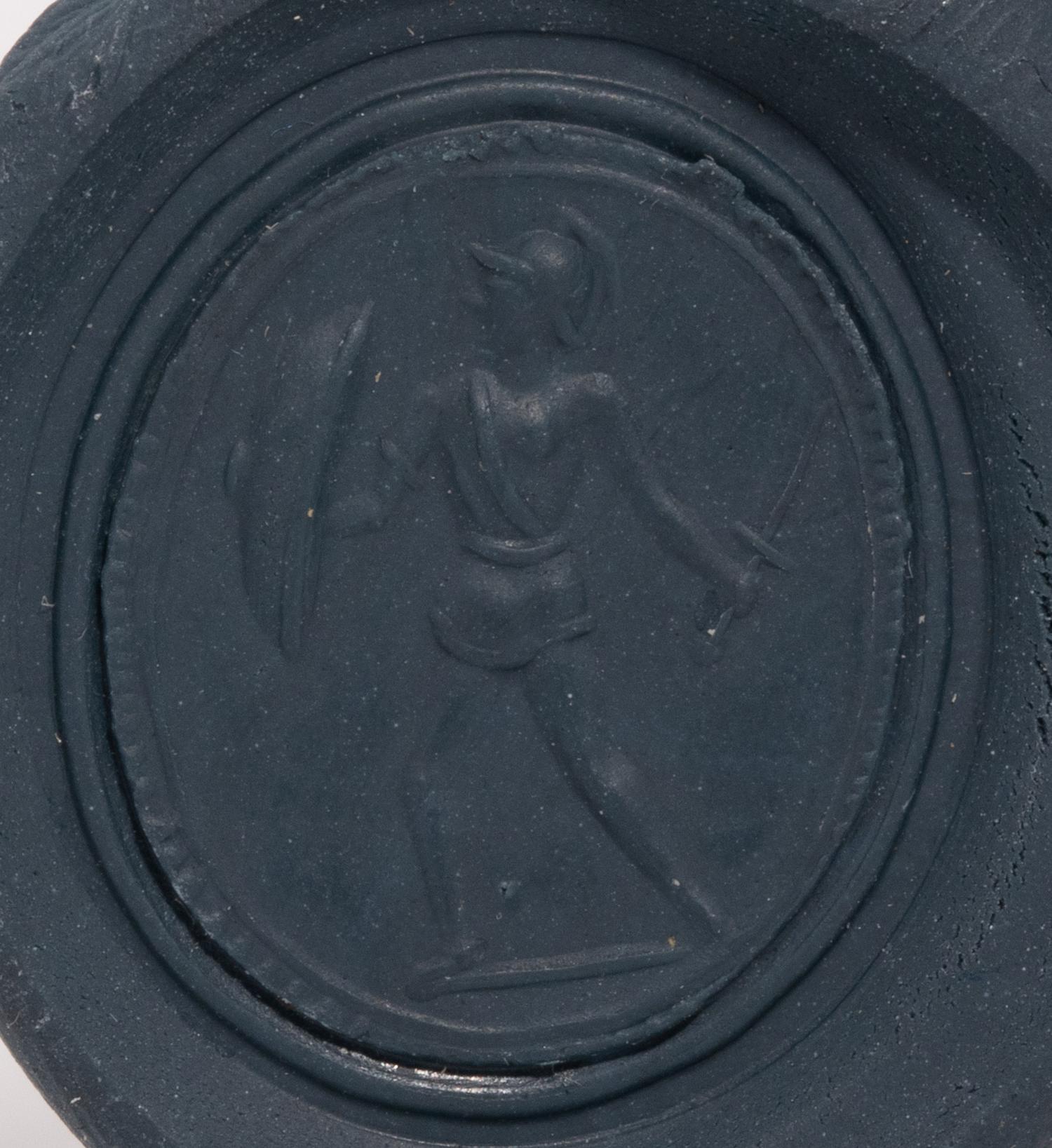 A Neoclassical Gold and Banded Agate Finger Ring with a Warrior on Guard