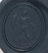 A Neoclassical Gold and Banded Agate Finger Ring with a Warrior on Guard