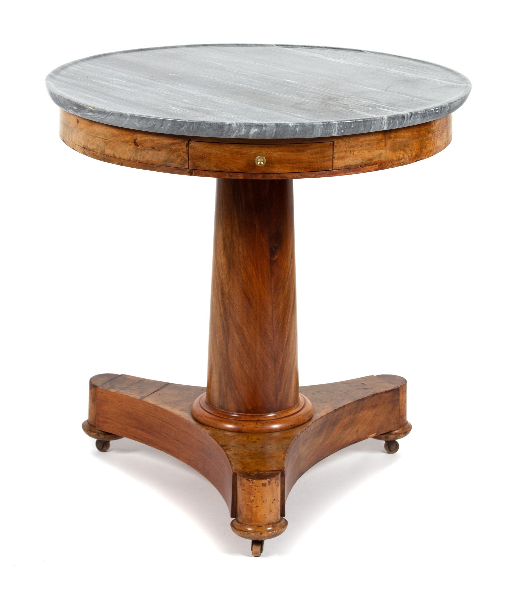 A Continental Mahogany & Walnut Pedestal Table Height 32 x diameter 30 1/2 inches. — SECOND QUARTER 19TH CENTURY
