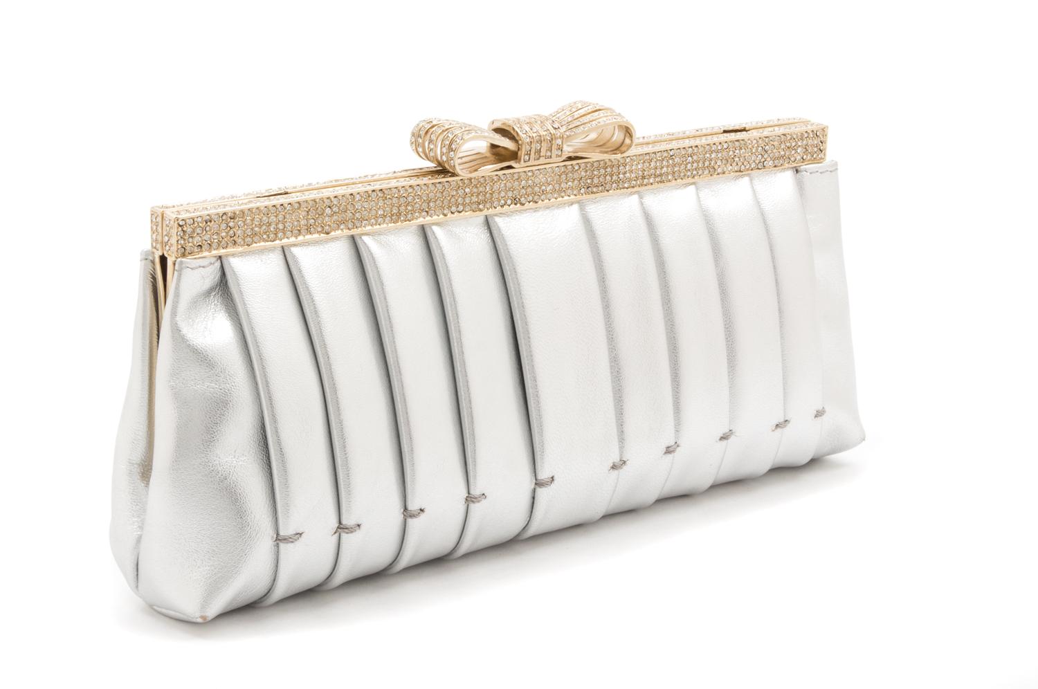 A Valentino Silver Metallic Leather Clutch, 9.5" x 4" x 2".