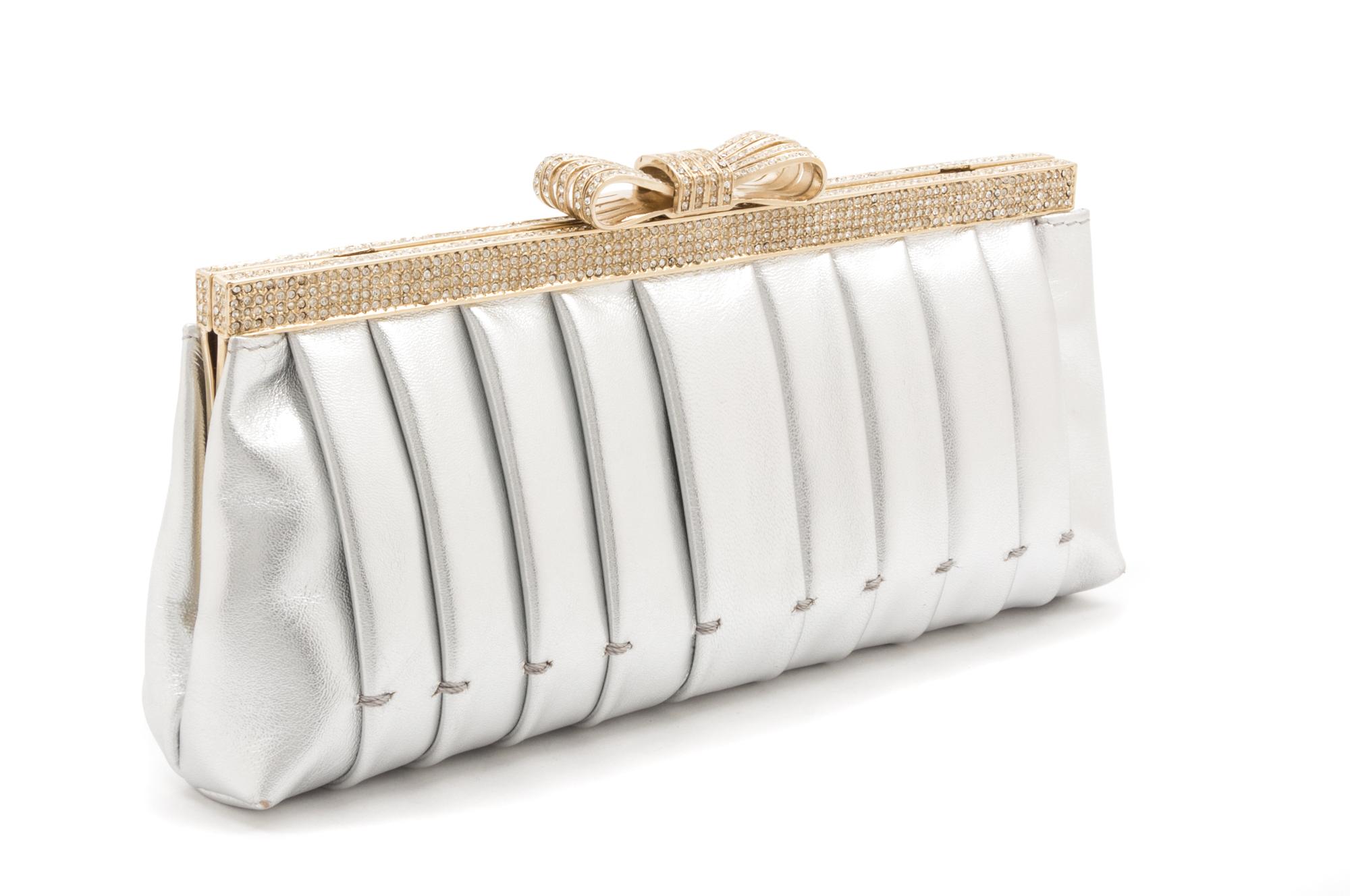 A Valentino Silver Metallic Leather Clutch, 9.5" x 4" x 2".