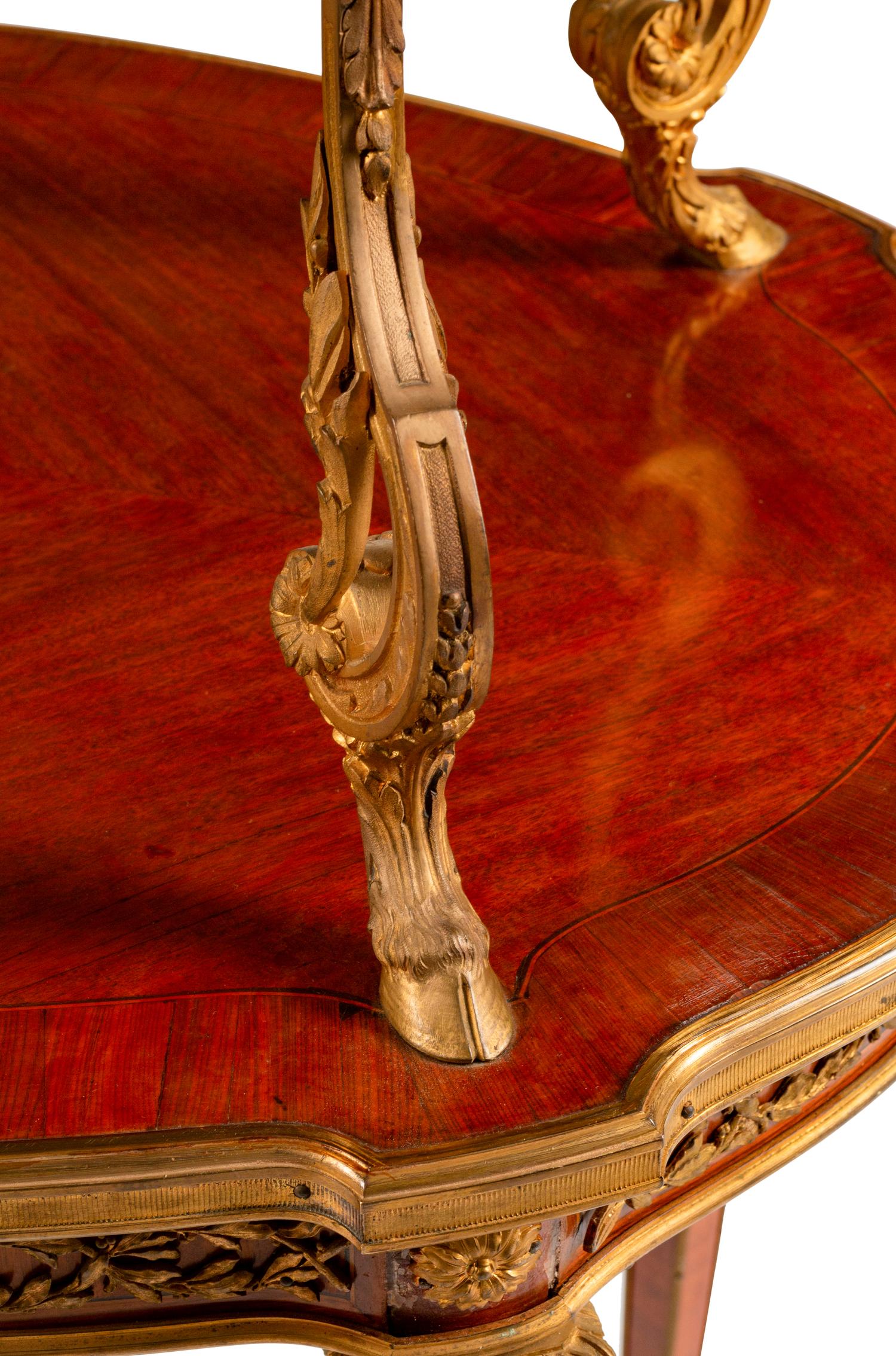 A Louis XVI Style Gilt-Bronze-Mounted Kingwood Two-Tier Tea Table