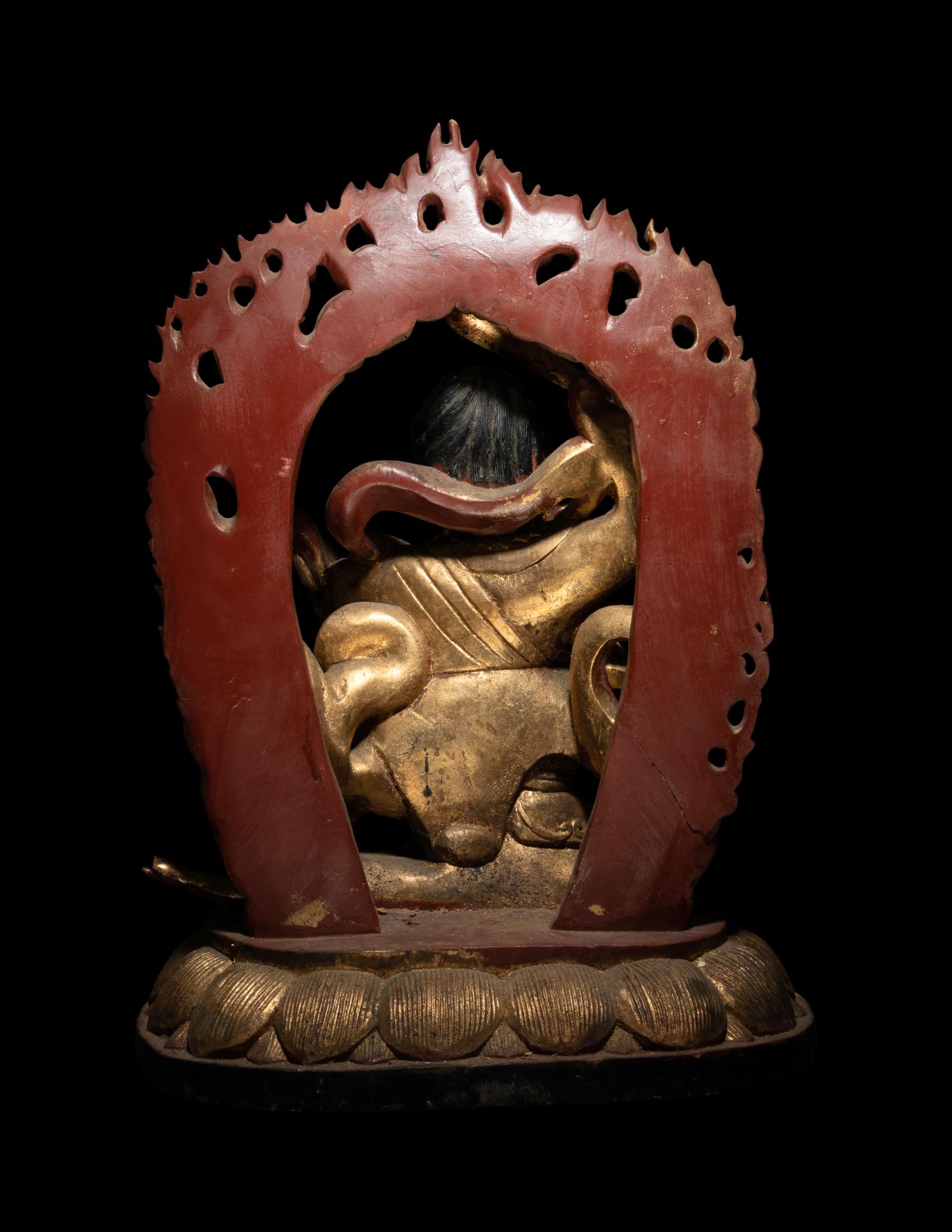 A Large Sino-Tibetan Gilt and Polychrome Lacquered Carved Wood Figure of a Dharmapala