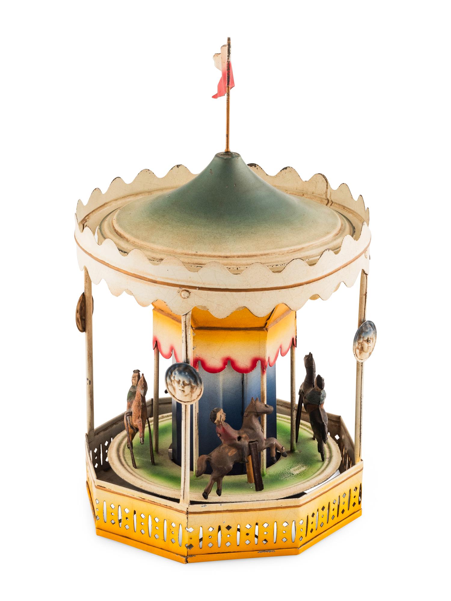 A German Tin Lithograph Wind Up Carousel Toy