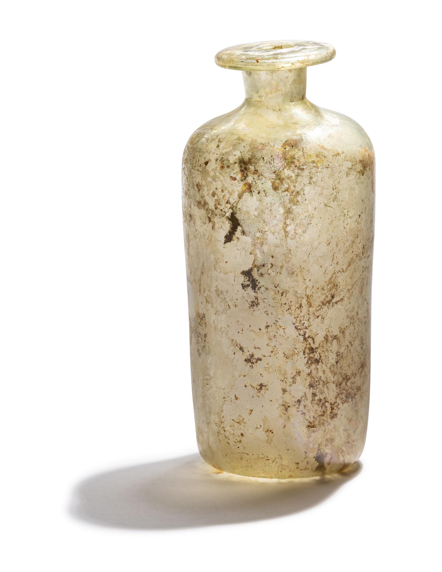 A Roman Pale Blue Glass Bottle