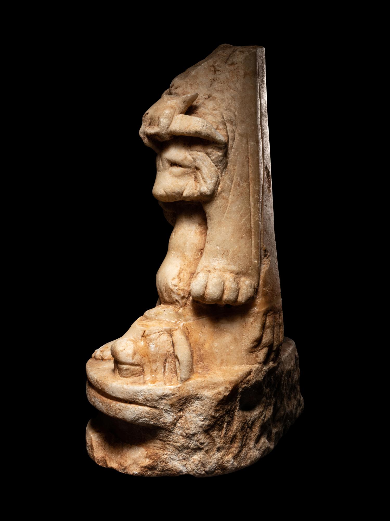 A Roman Marble Sculpture Base from a Statue of Hercules