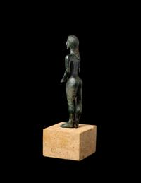A Greek Bronze Kouros