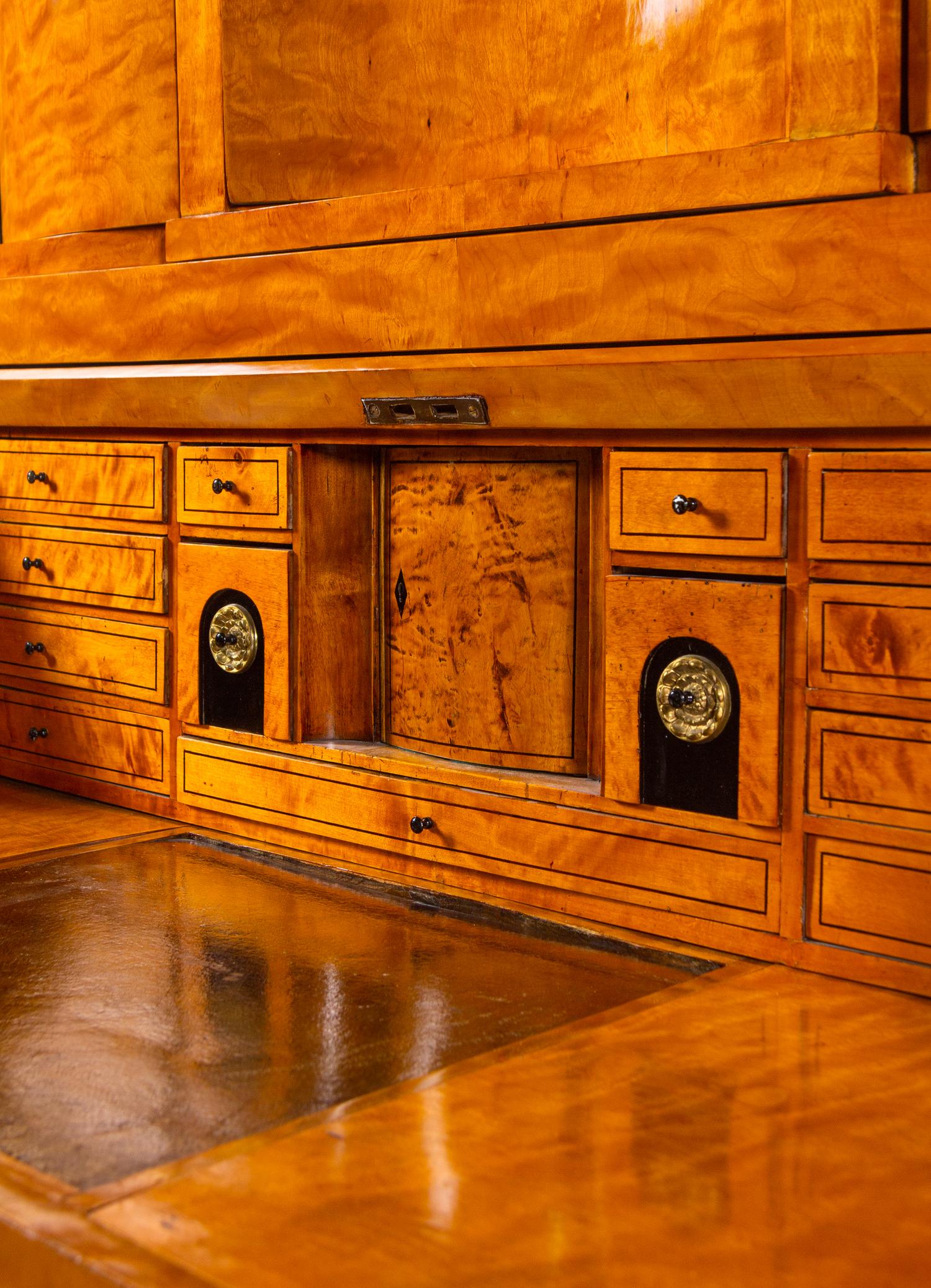 A Biedermeier Parcel Ebonized Birch Secretary Bureau