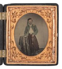 [CIVIL WAR]. Sixth plate hand-colored tintype of a Zouave officer posed with his sword.