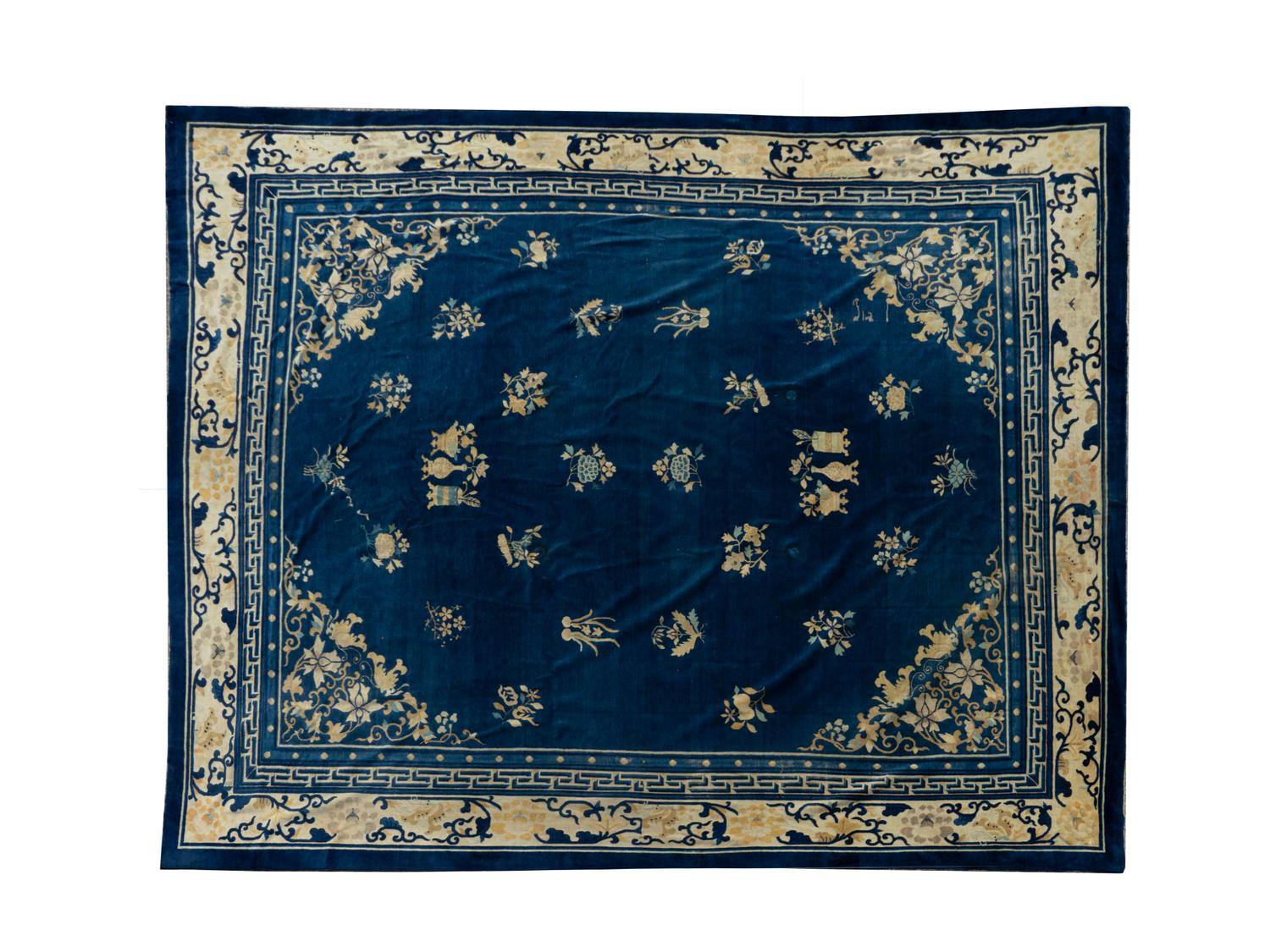 A Chinese Wool Rug — 20TH CENTURY