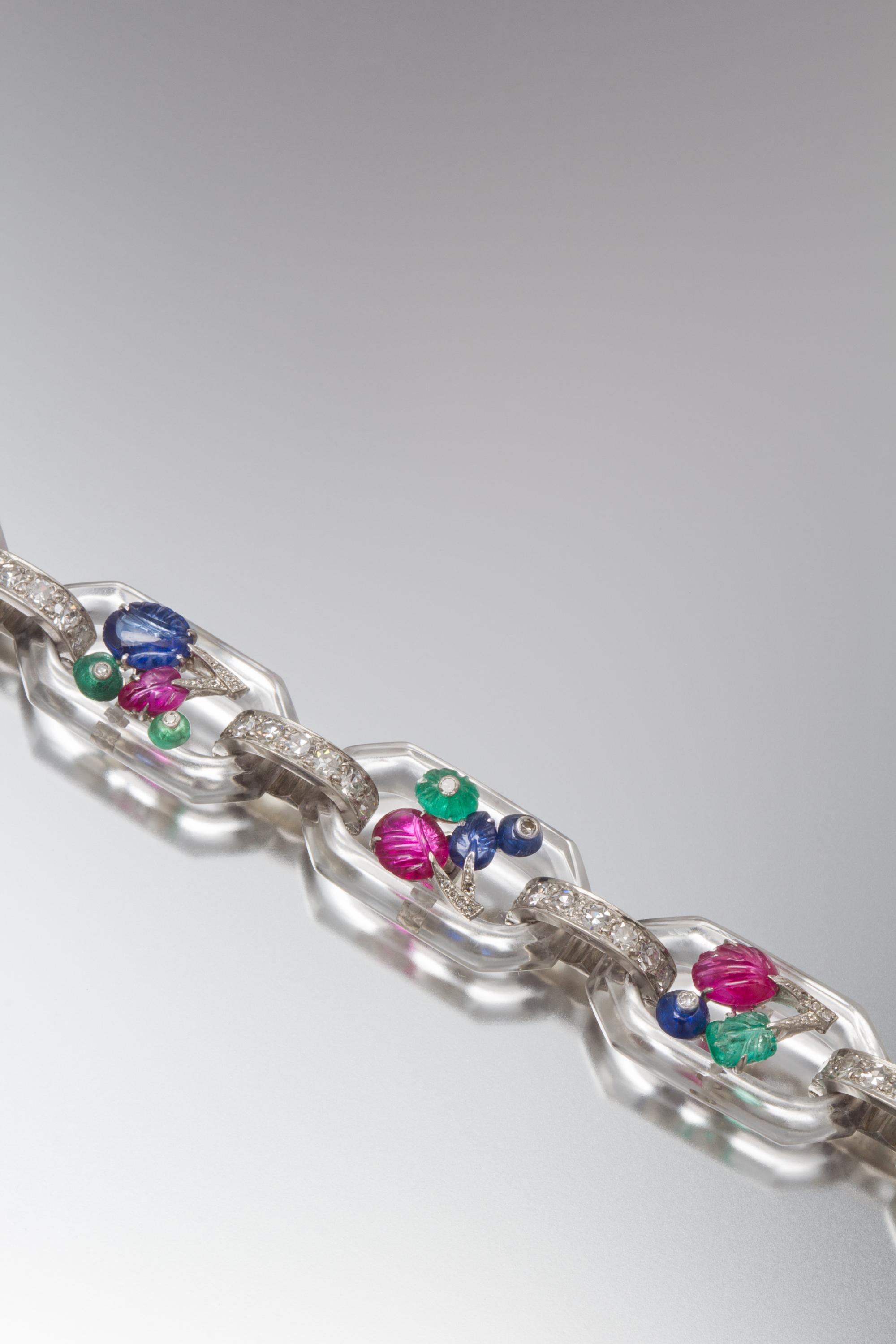 An Art Deco Platinum, Gold, Rock Crystal, Diamond and Multi Gem Tutti Frutti Bracelet, Cartier, 17.00 dwts.