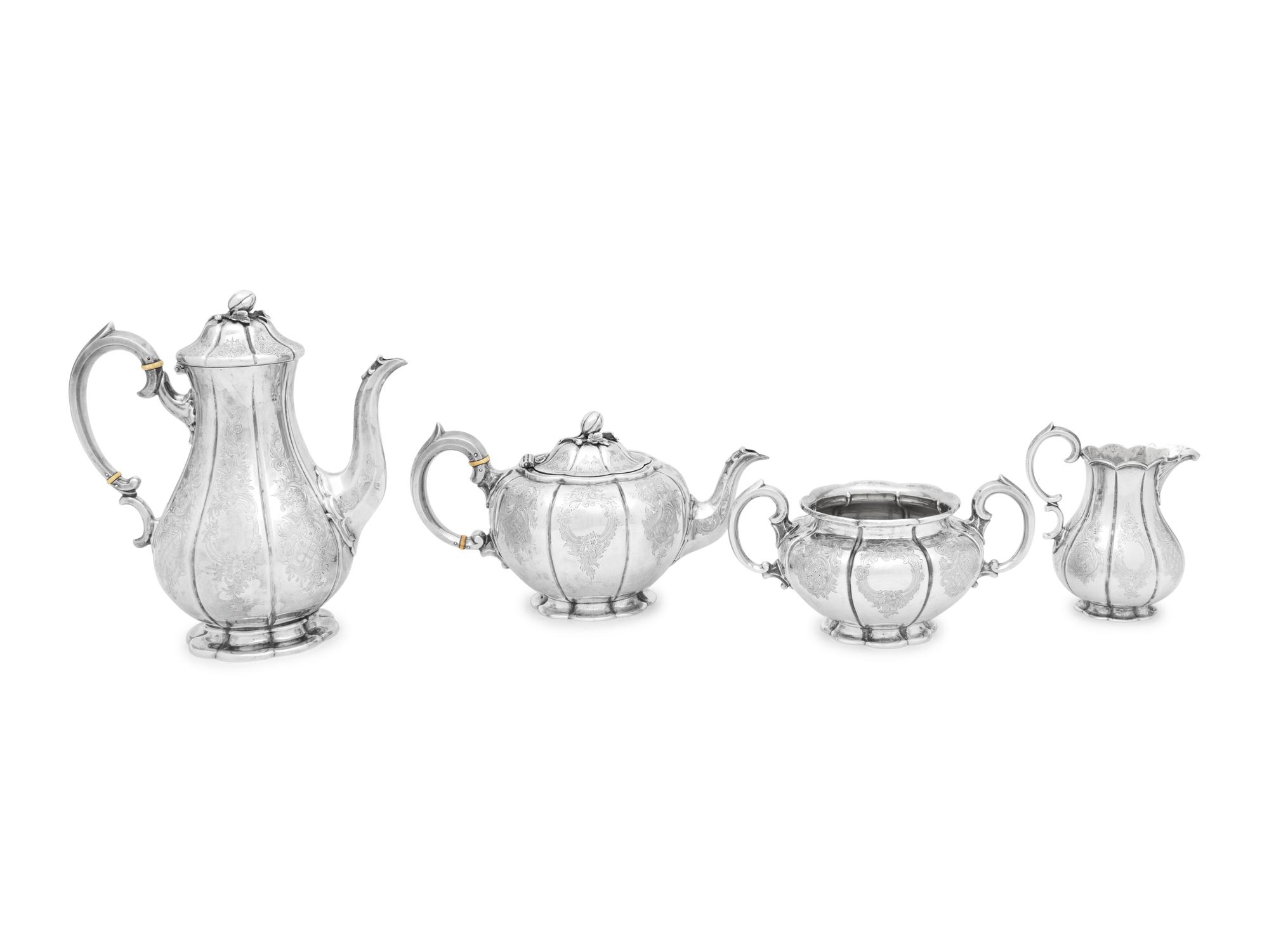 A Cased Victorian Silver Four-Piece Tea and Coffee Service