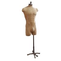 An Iron and Muslin Male Mannequin 26" W x 18" D x 67" H — United States, 20th Century