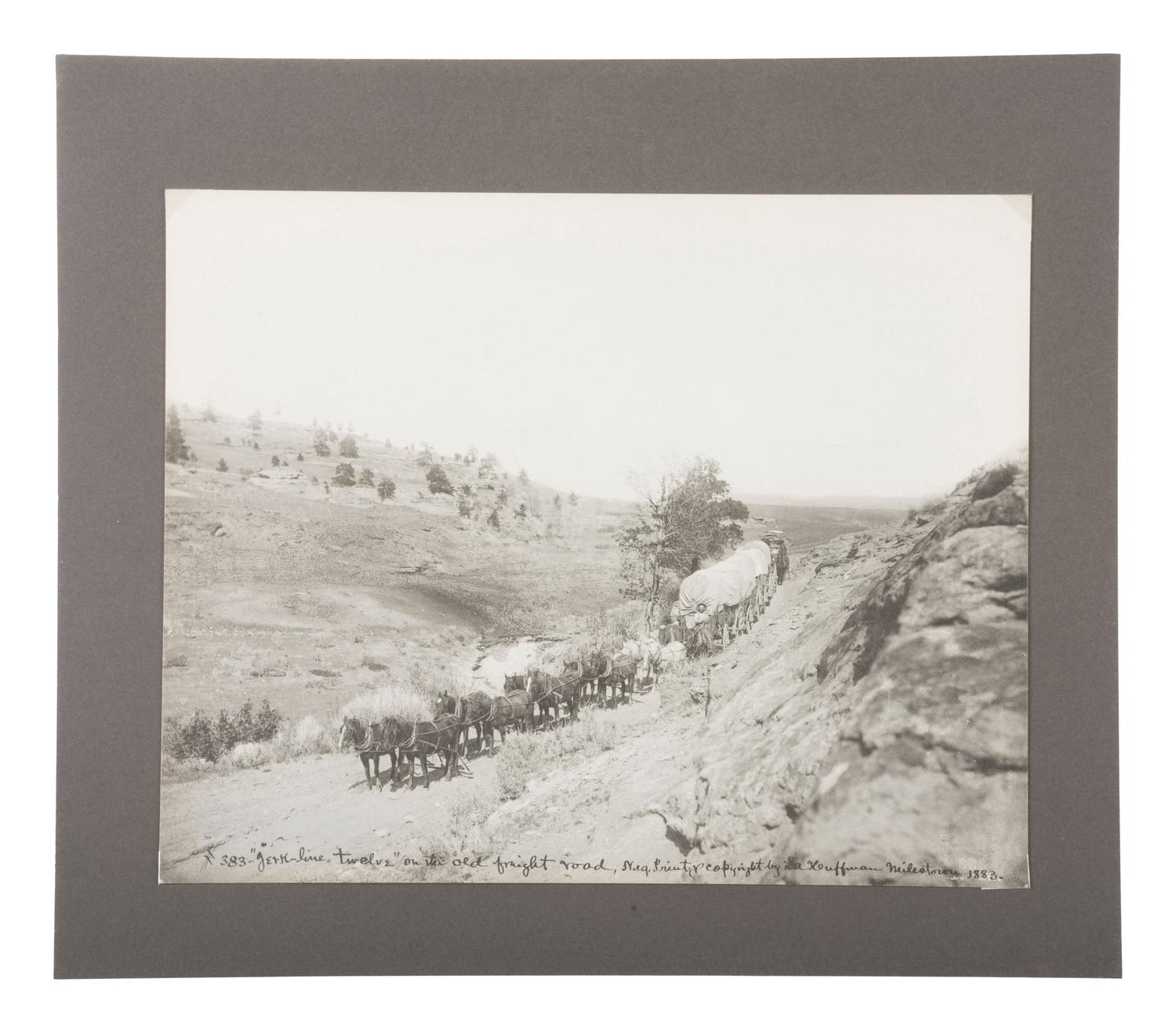 HUFFMAN, Laton Alton (1854-1931), photographer. “Jerk-line twelve” on the old freight road, Milestown. [Miles City, MT]: 1883.
