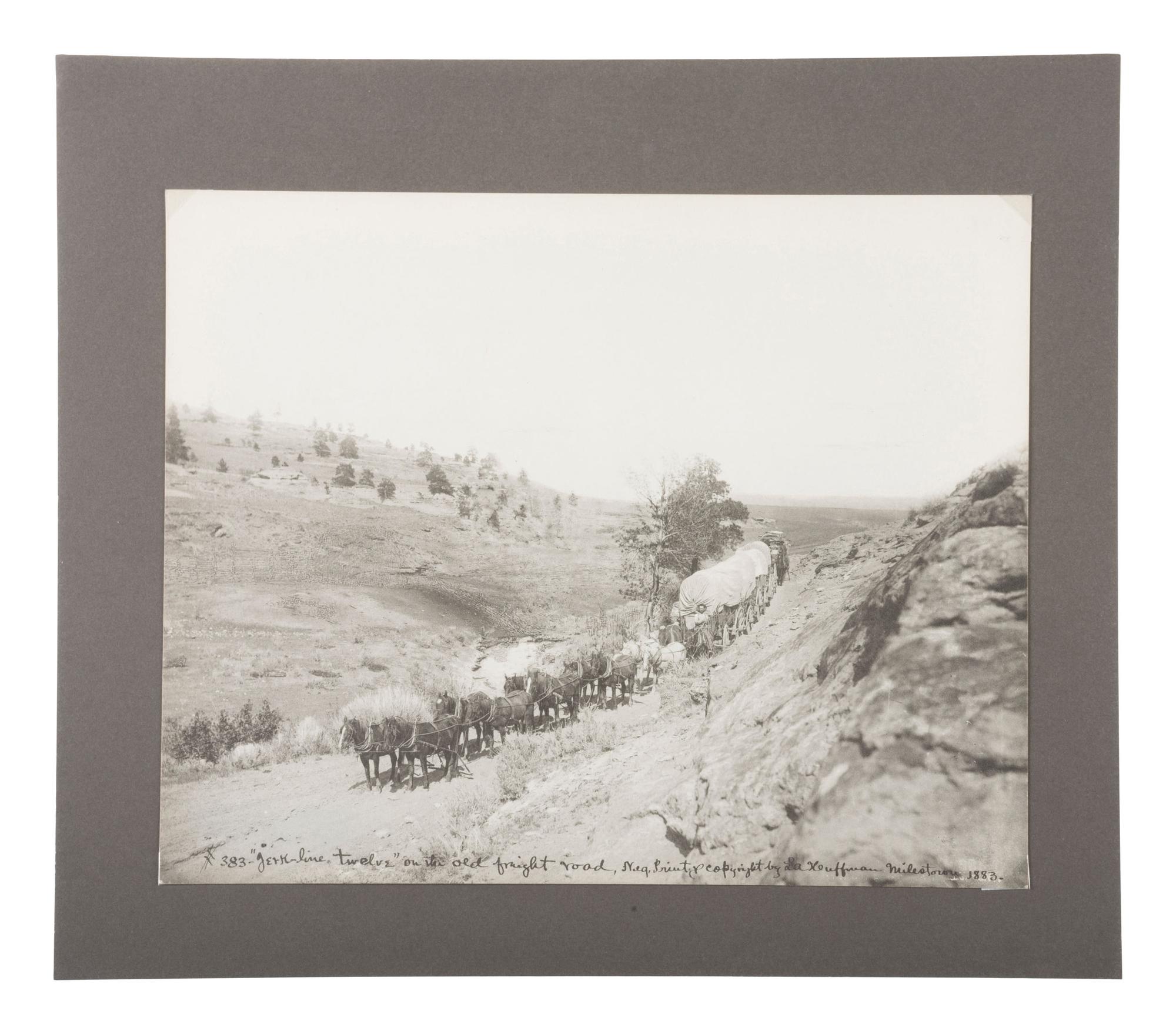 HUFFMAN, Laton Alton (1854-1931), photographer. “Jerk-line twelve” on the old freight road, Milestown. [Miles City, MT]: 1883.
