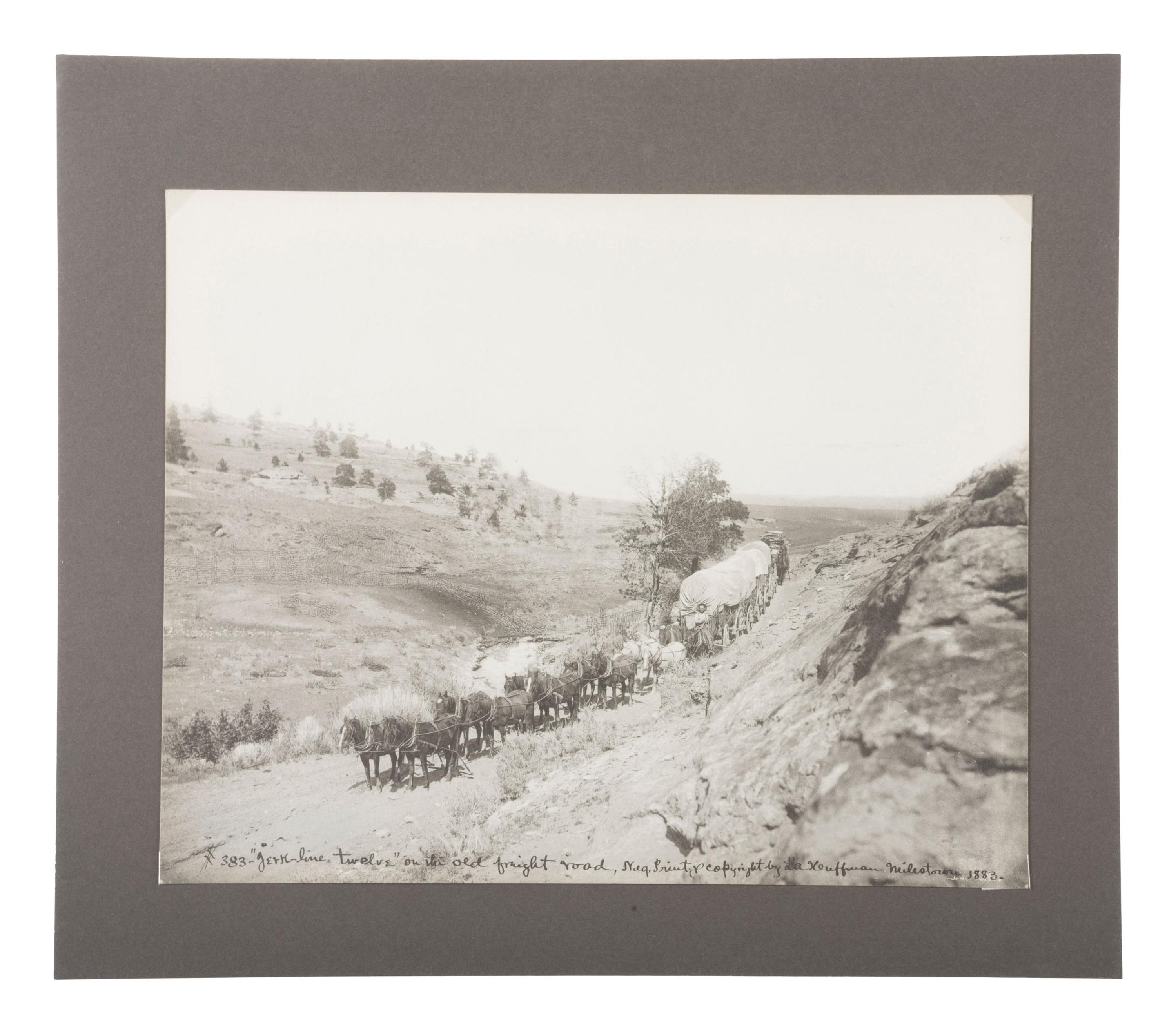 HUFFMAN, Laton Alton (1854-1931), photographer. “Jerk-line twelve” on the old freight road, Milestown. [Miles City, MT]: 1883.