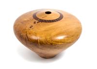 James Edward Barnes, WOOLWINE, VA, wood turned vessel, with an intentional break and inlaid geometric design repair