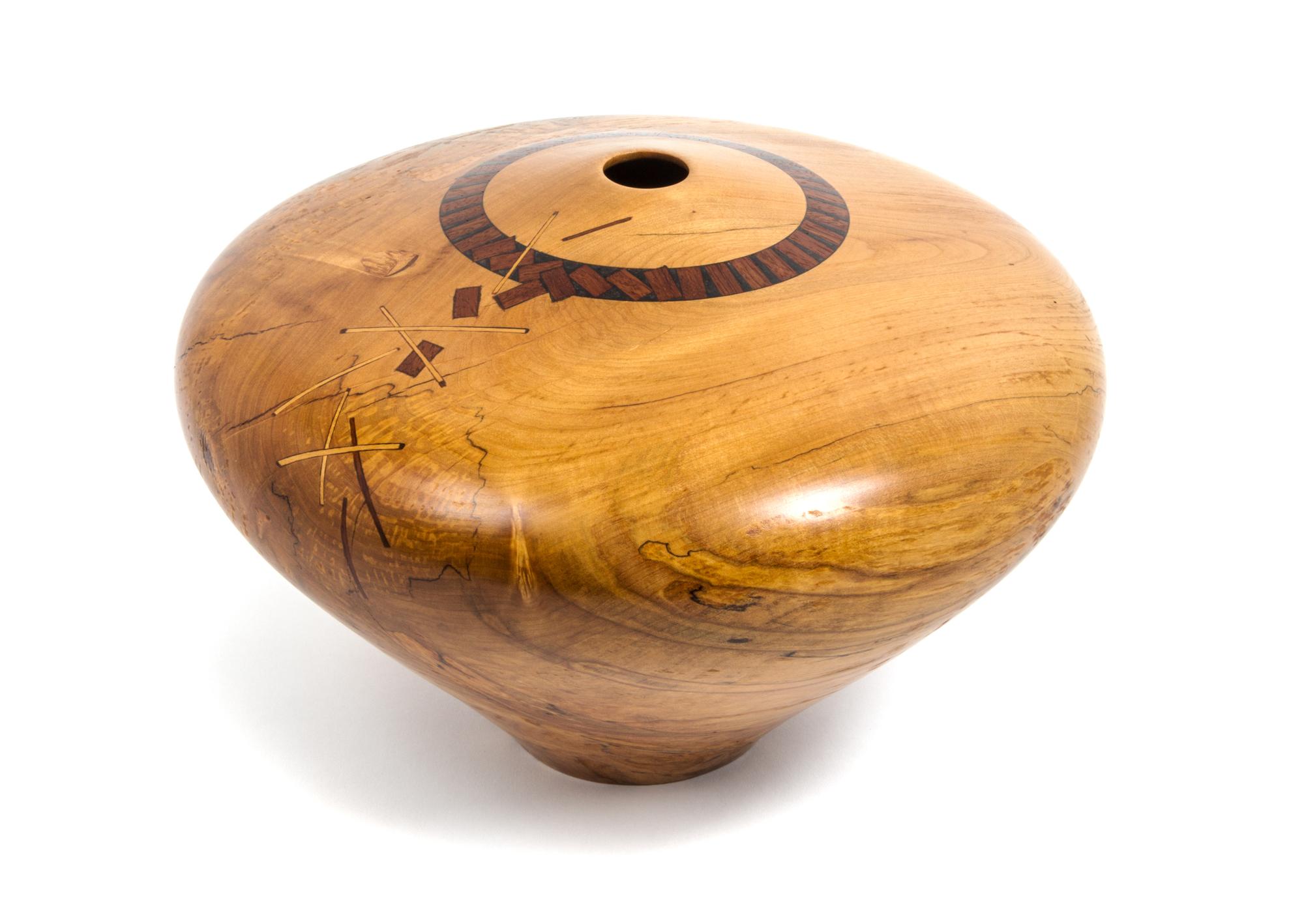 James Edward Barnes, WOOLWINE, VA, wood turned vessel, with an intentional break and inlaid geometric design repair