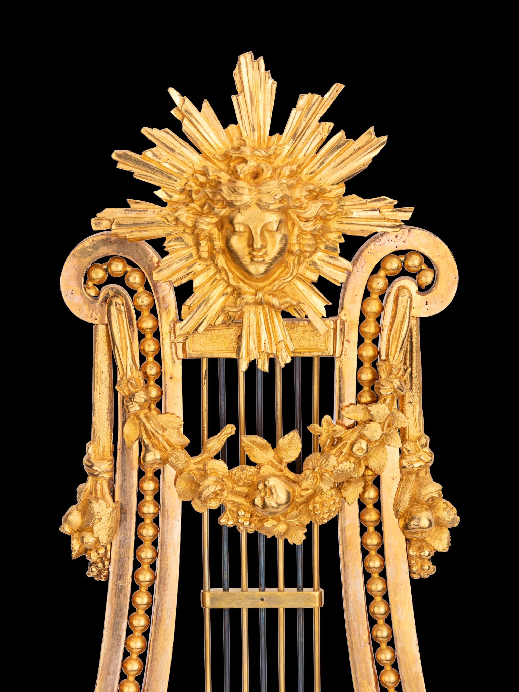 A French Gilt Bronze and Marble Lyre-Form Clock, Bourdier