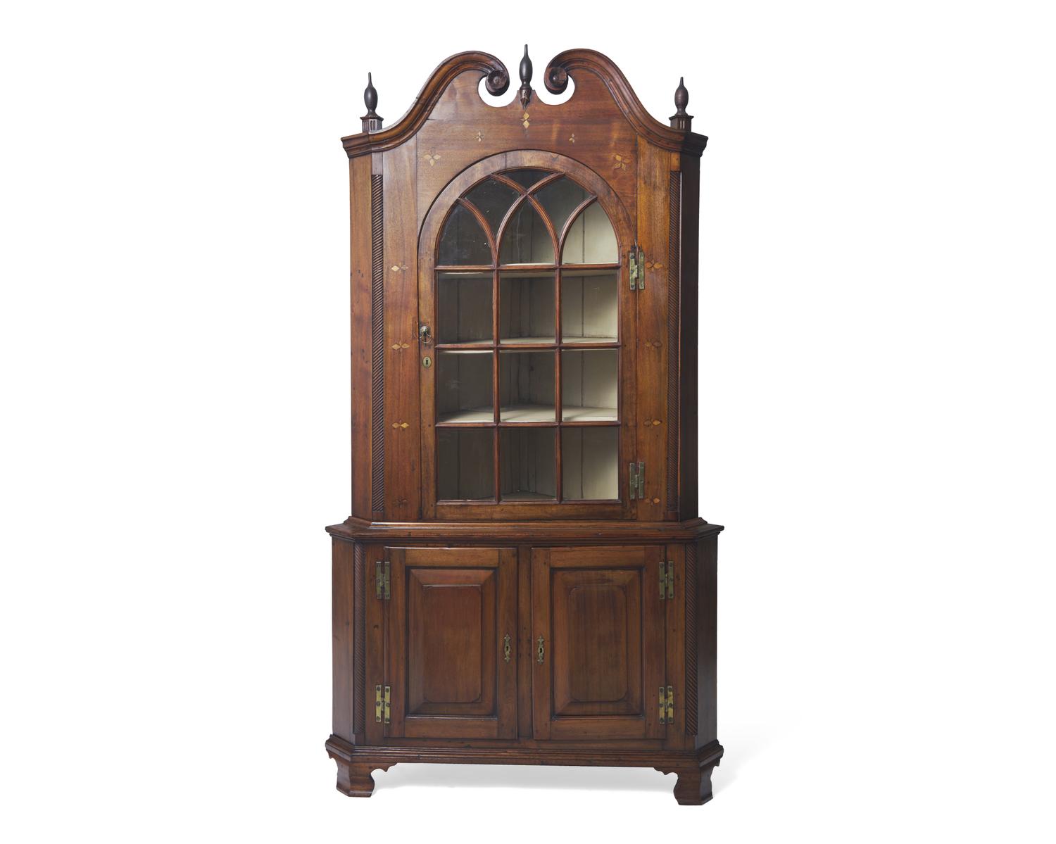 A Chippendale Inlaid Walnut Corner Cupboard, Pennsylvania, Late 18th Century
