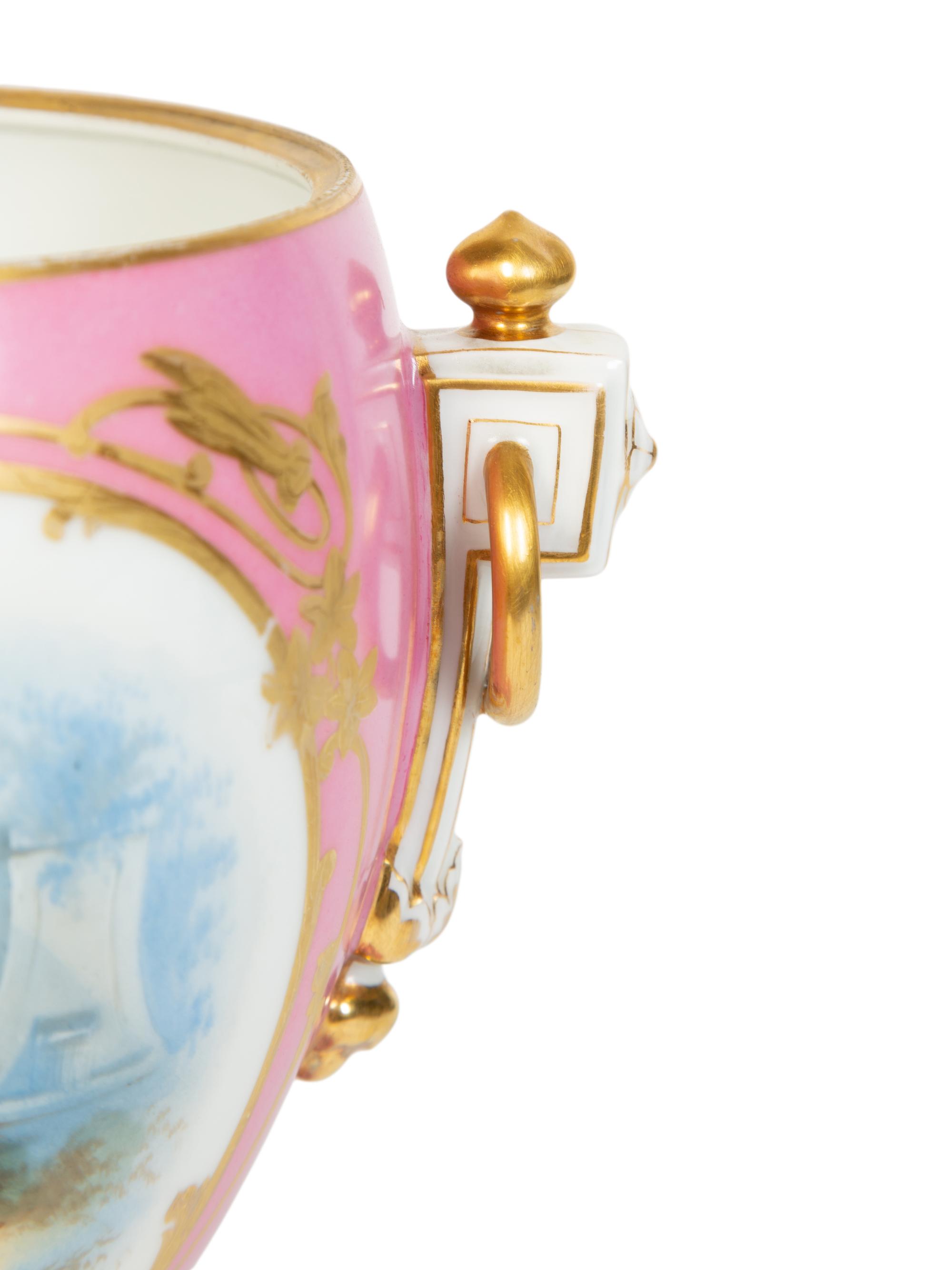 A Pair of Sèvres Style Porcelain Urns