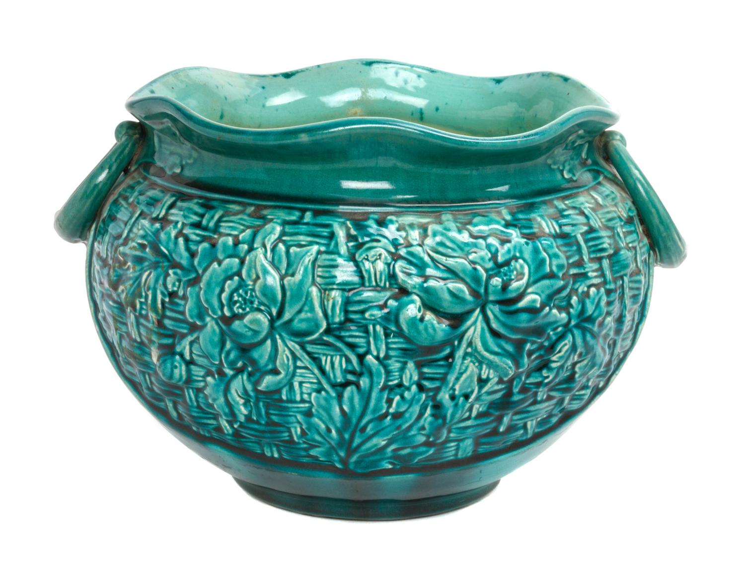 A Bretby Pottery Jardiniere Width over handles 14 3/4 inches.