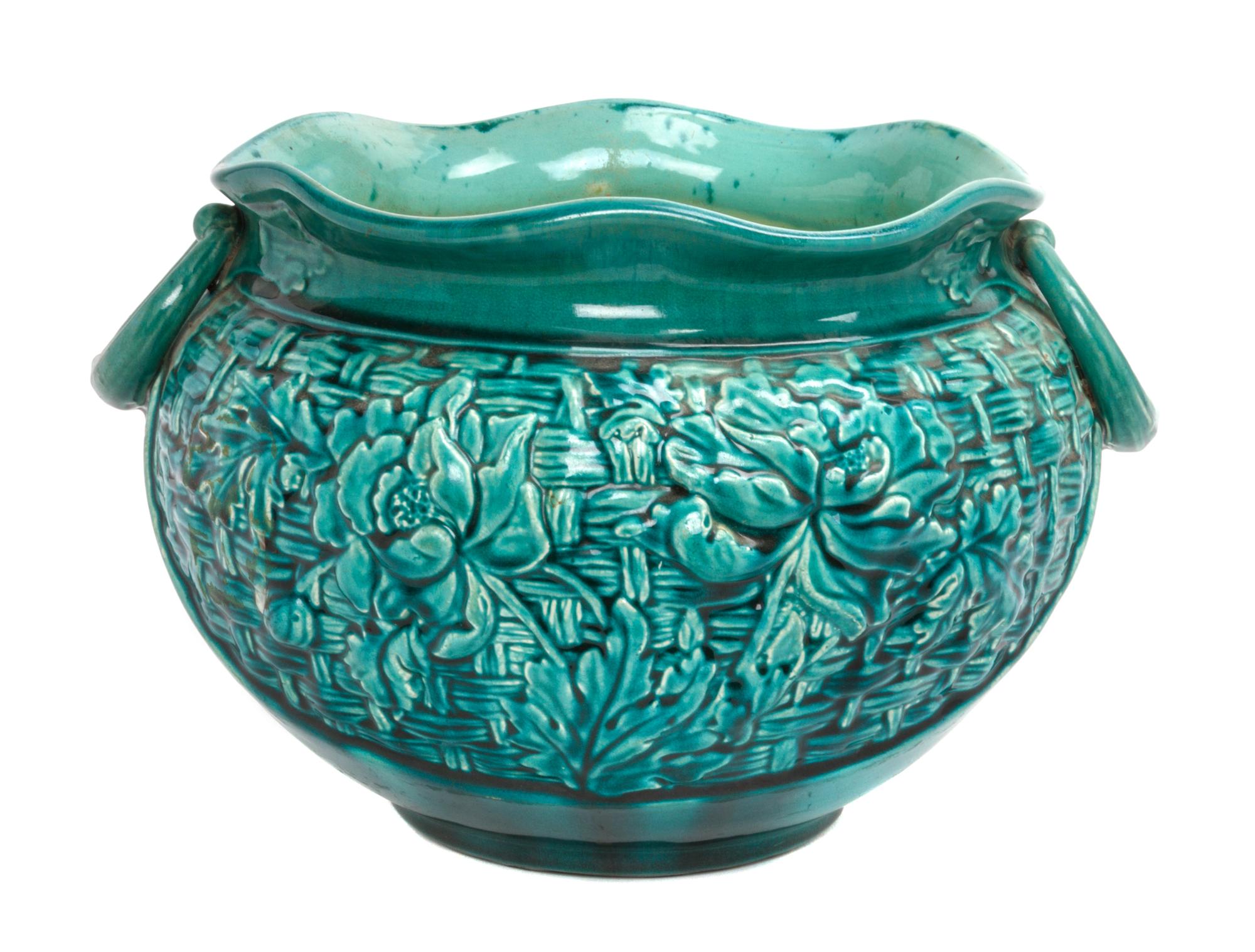 A Bretby Pottery Jardiniere Width over handles 14 3/4 inches.
