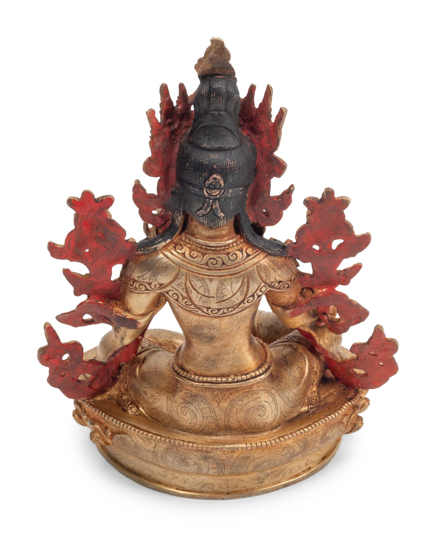 A Southeast Asian Semiprecious Stone-Inset Gilt Bronze Seated Deity
