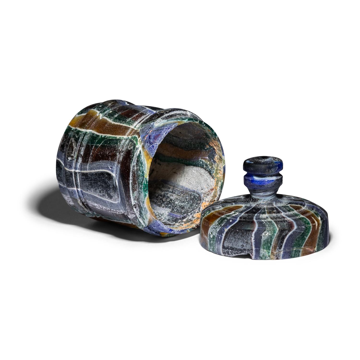 A Roman Marbled Cast Glass Pyxis