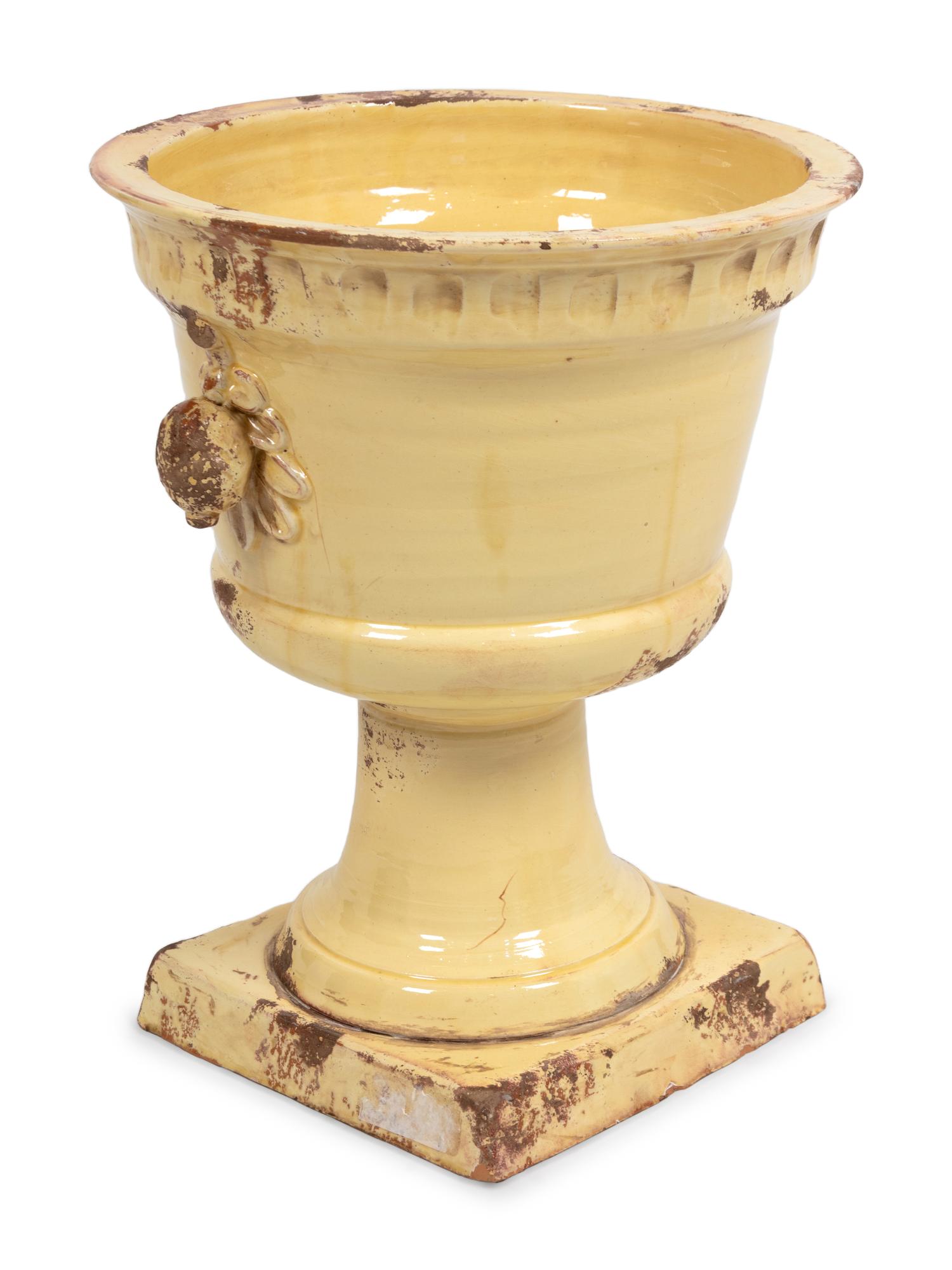 An Italian White Glazed Terracotta Urn
