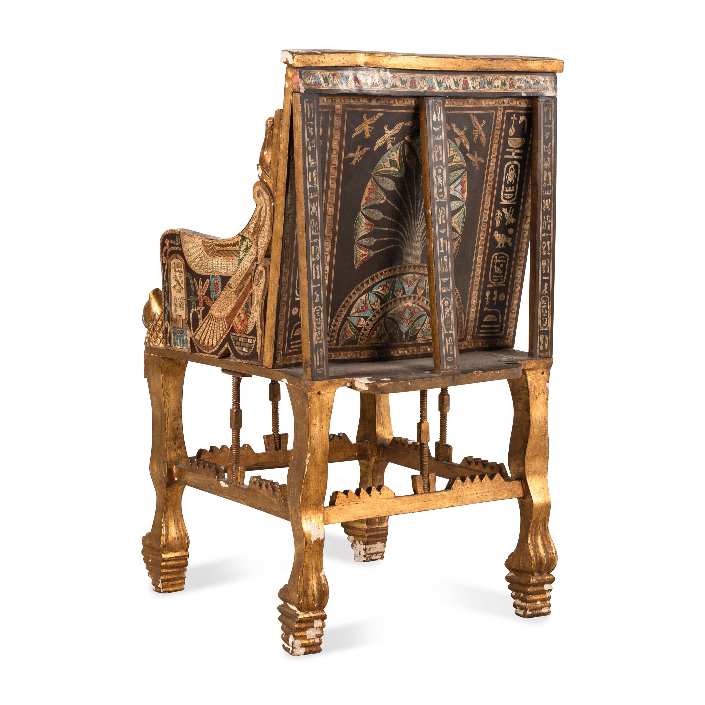 An Egyptian Style Polychrome-Painted and Giltwood Throne Chair