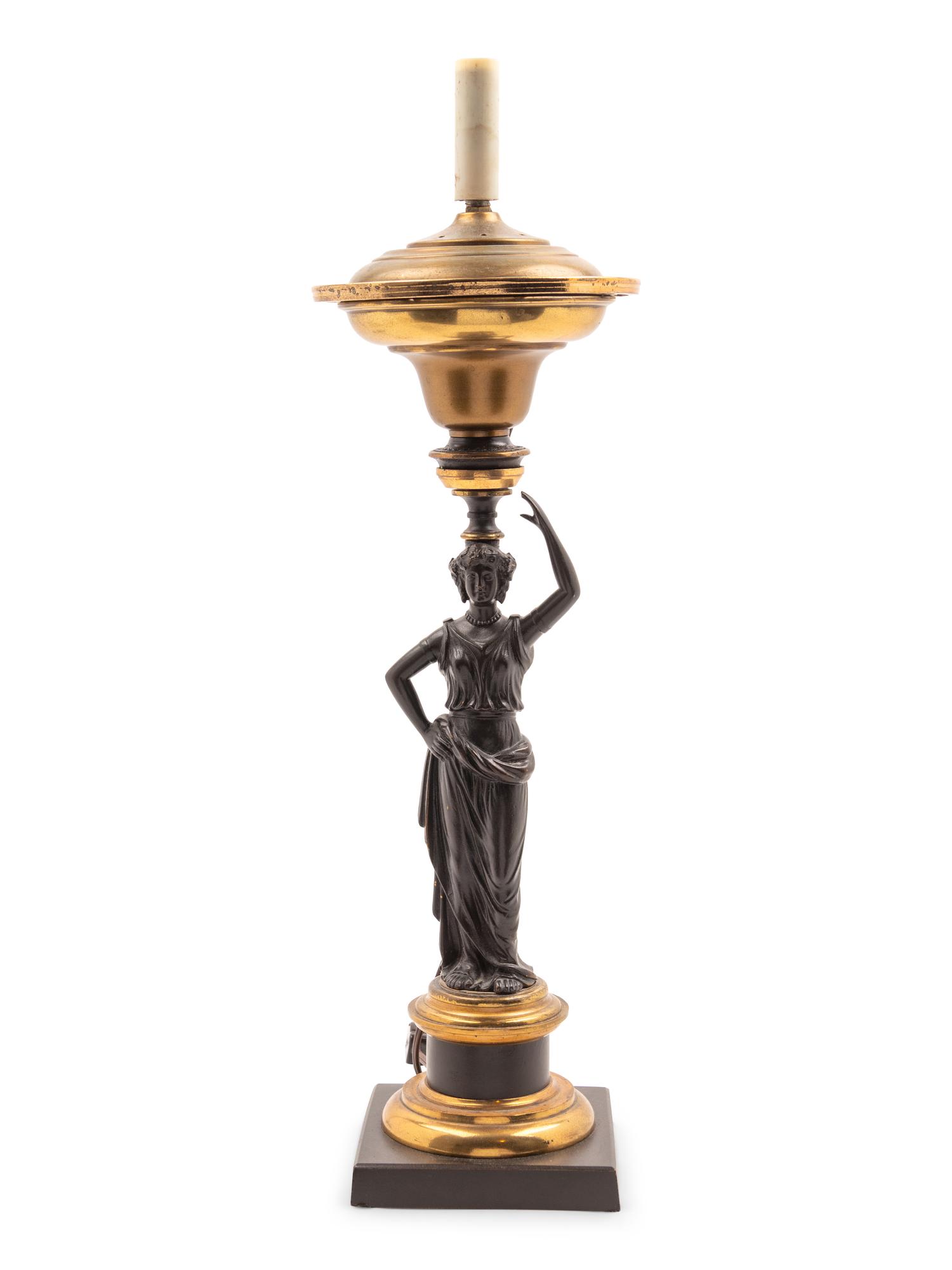 A Classical Patinated Bronze Figural Sinumbra Lamp
