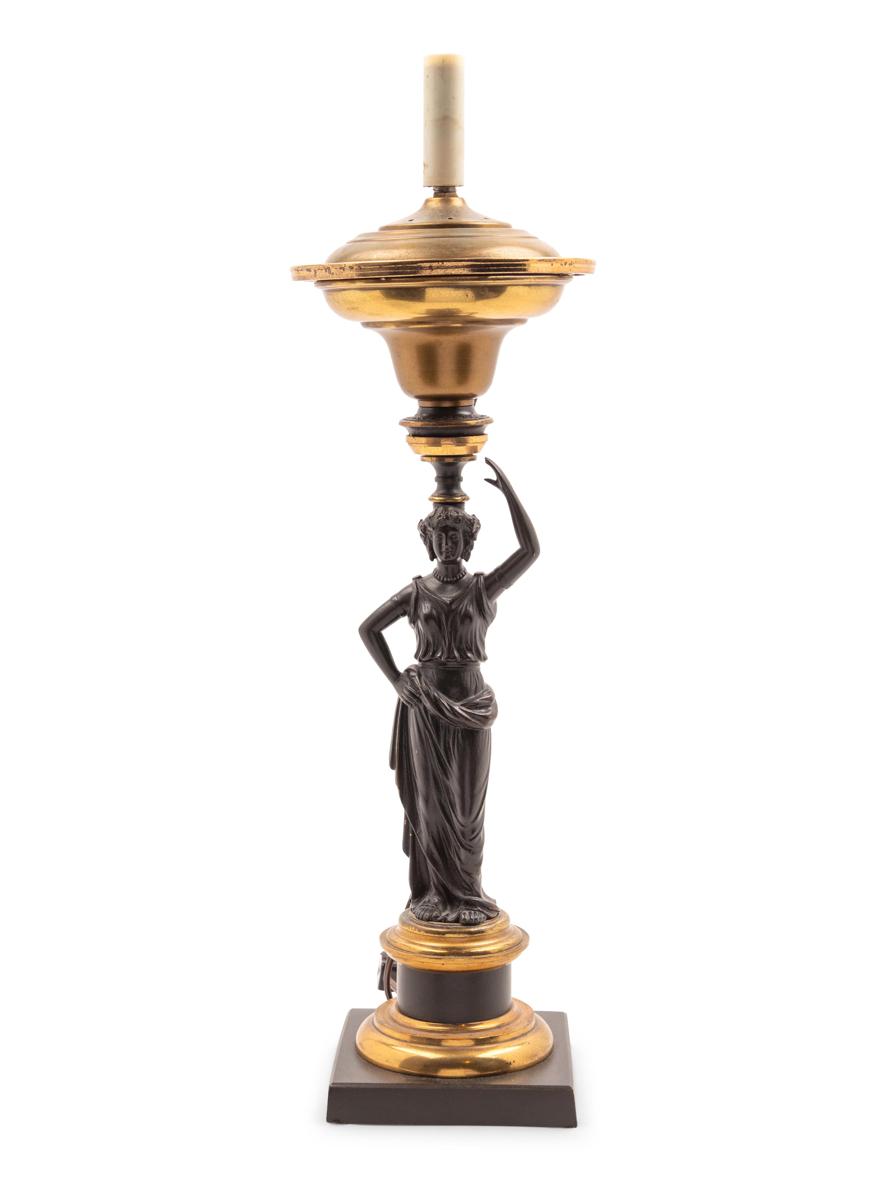 A Classical Patinated Bronze Figural Sinumbra Lamp
