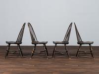 A Set of Four D.R. Dimes Black-Painted Hoop-Back Compass-Seat Windsor Chairs