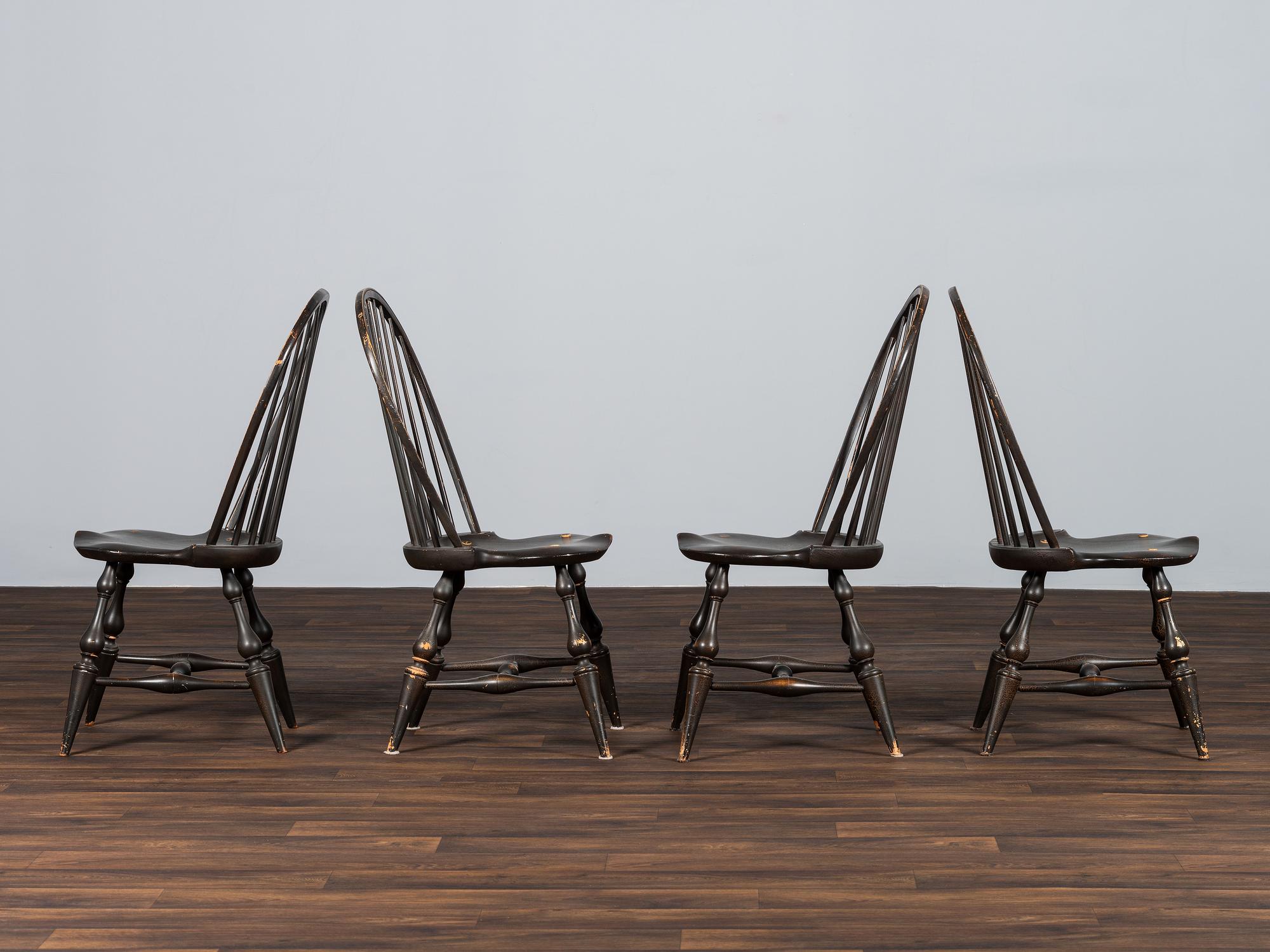 A Set of Four D.R. Dimes Black-Painted Hoop-Back Compass-Seat Windsor Chairs