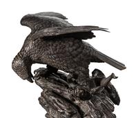A Japanese Bronze Figural Group of a Hawk Hunting Monkeys