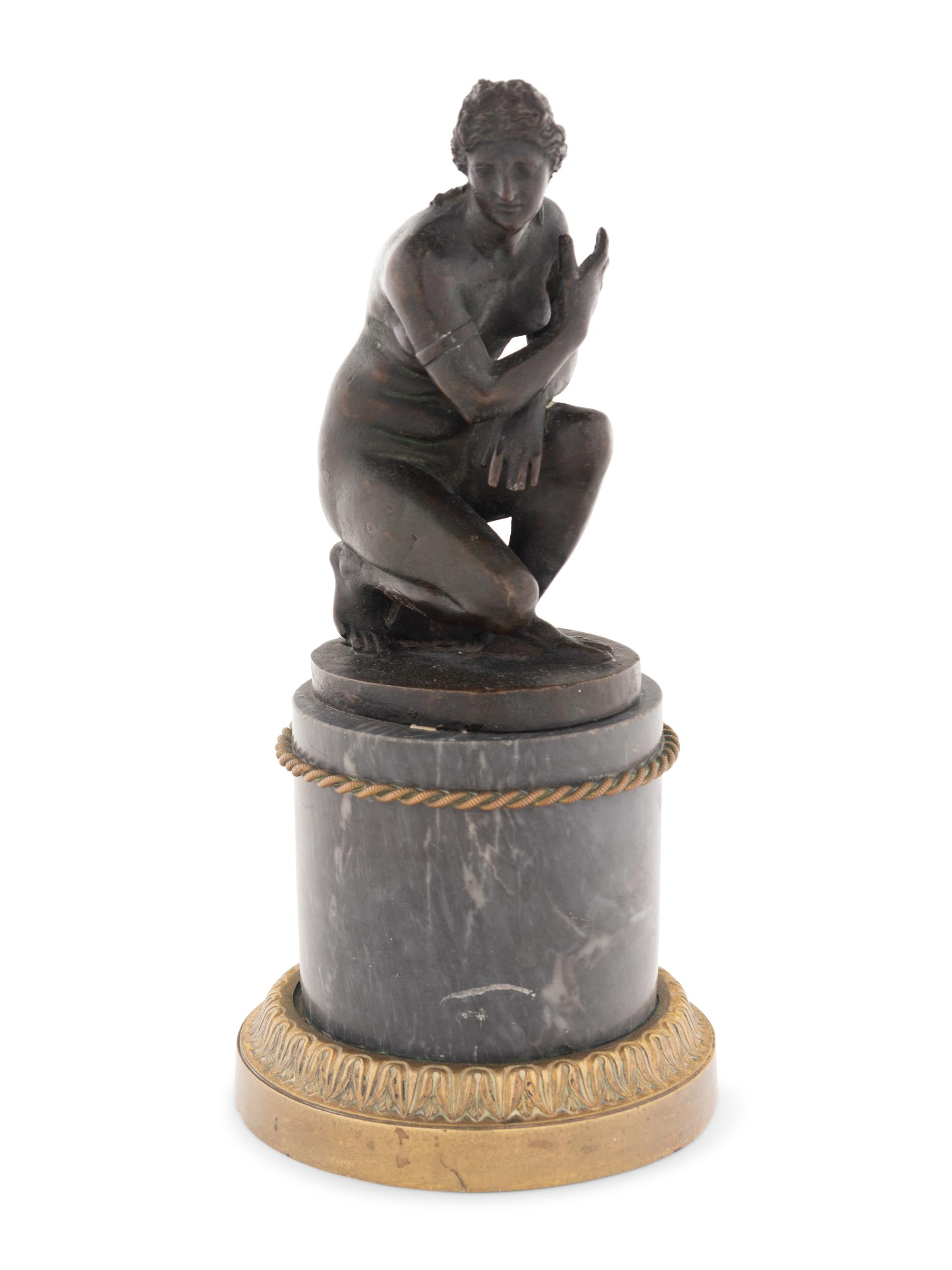 A Continental Bronze Figure of Venus on a Marble Base