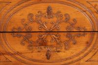 An Italian Carved Fruitwood Marble-Top Commode