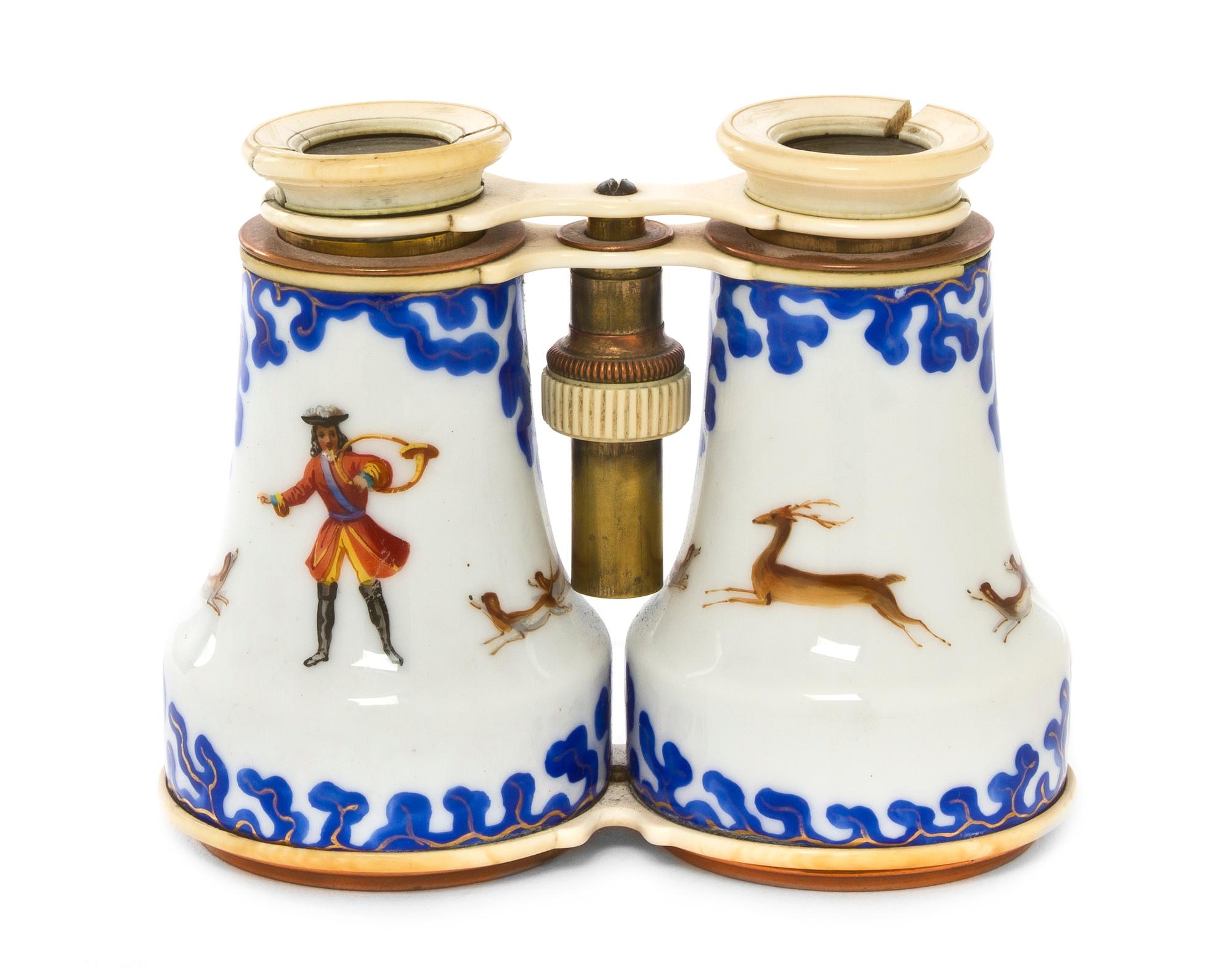 A Pair of Continental Enameled and Ivory Inset Opera Glasses, Width 4 7/8 inches.