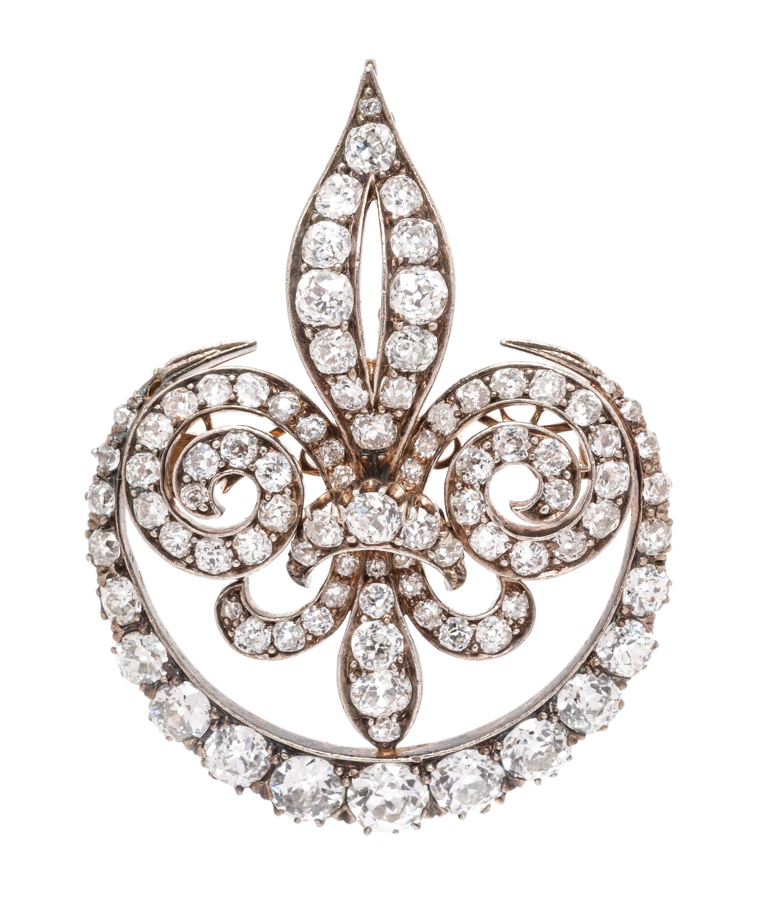 A Victorian Silver Topped Gold and Diamond Fleur De Lys Brooch, 14.70 dwts.