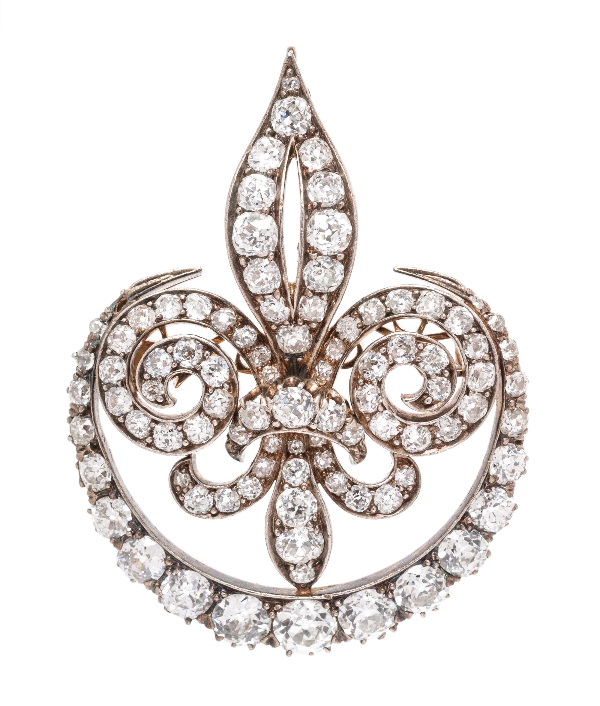 A Victorian Silver Topped Gold and Diamond Fleur De Lys Brooch, 14.70 dwts.
