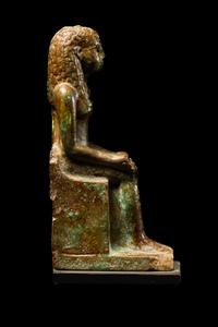 An Egyptian Faience Enthroned Queen or Goddess