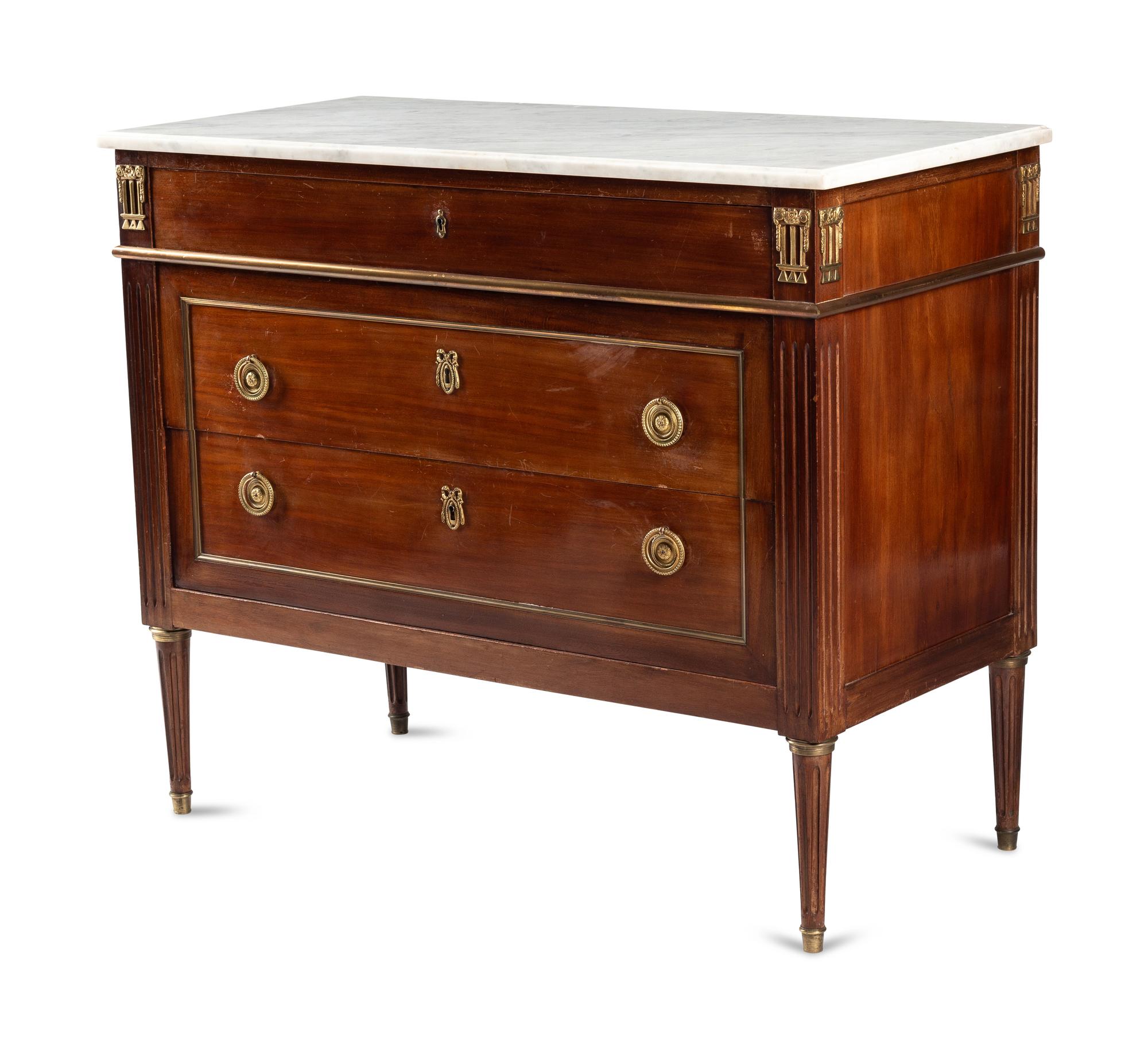 A Louis XVI Style Gilt Bronze Mounted Mahogany Marble-Top Commode