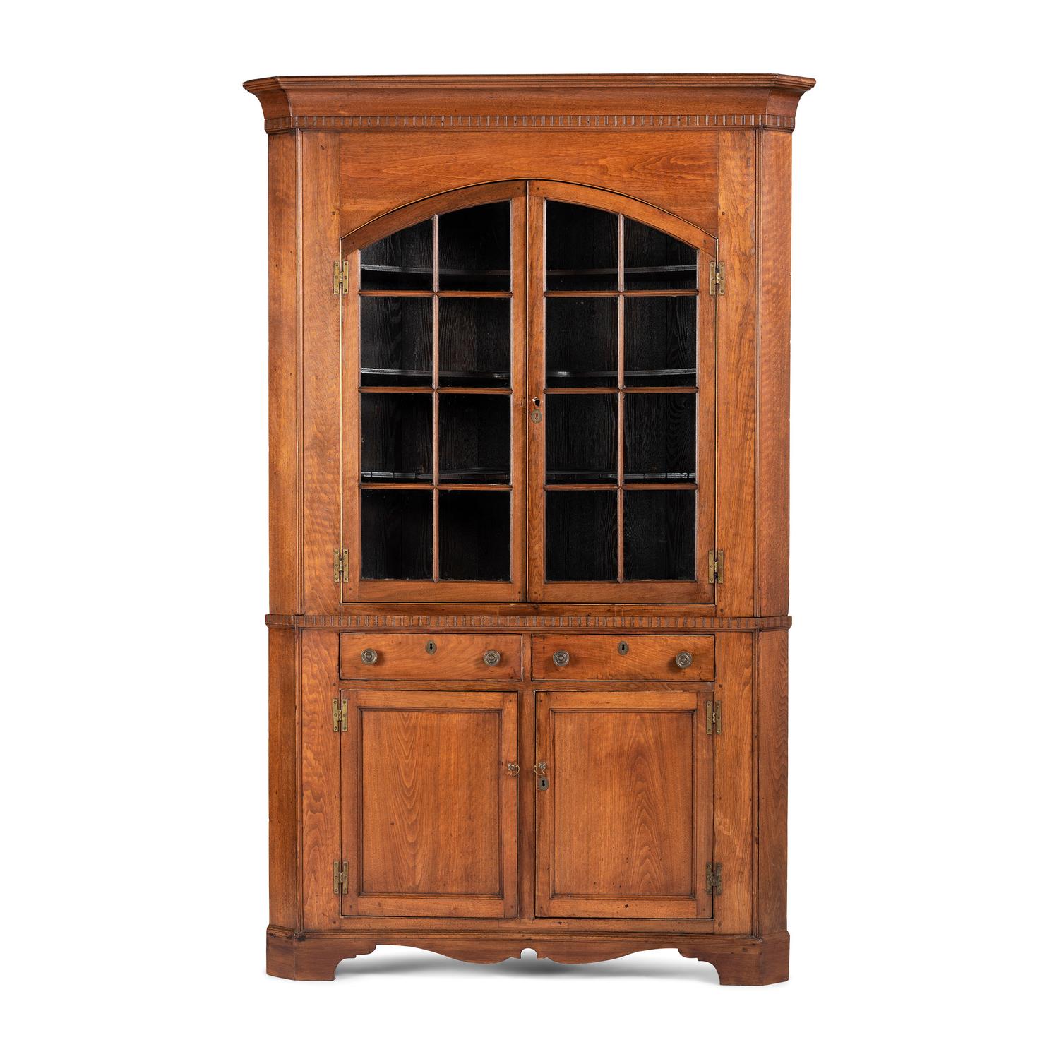 A Chippendale Incised Walnut Corner Cupboard