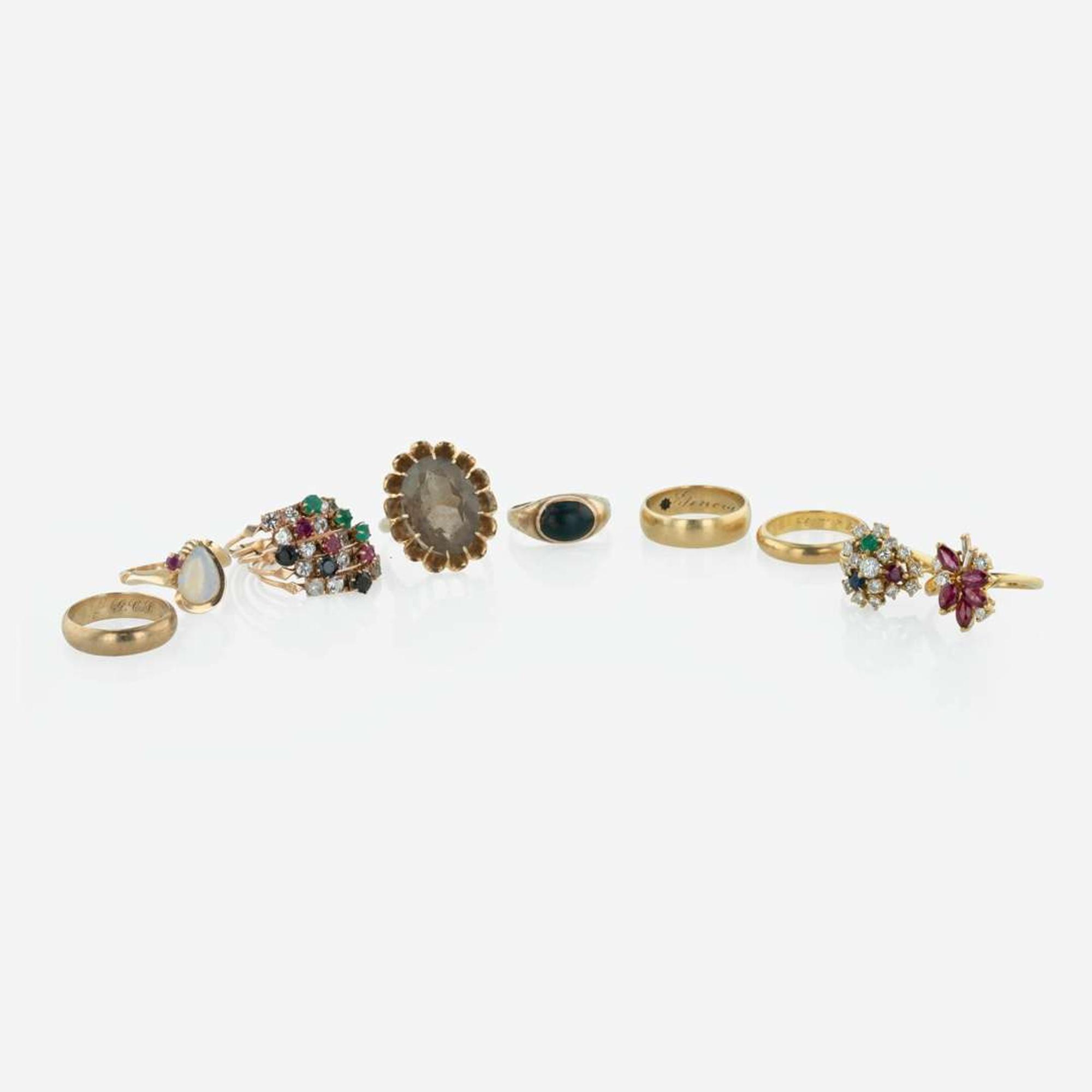 A Collection of Yellow Gold and Gemstone Rings