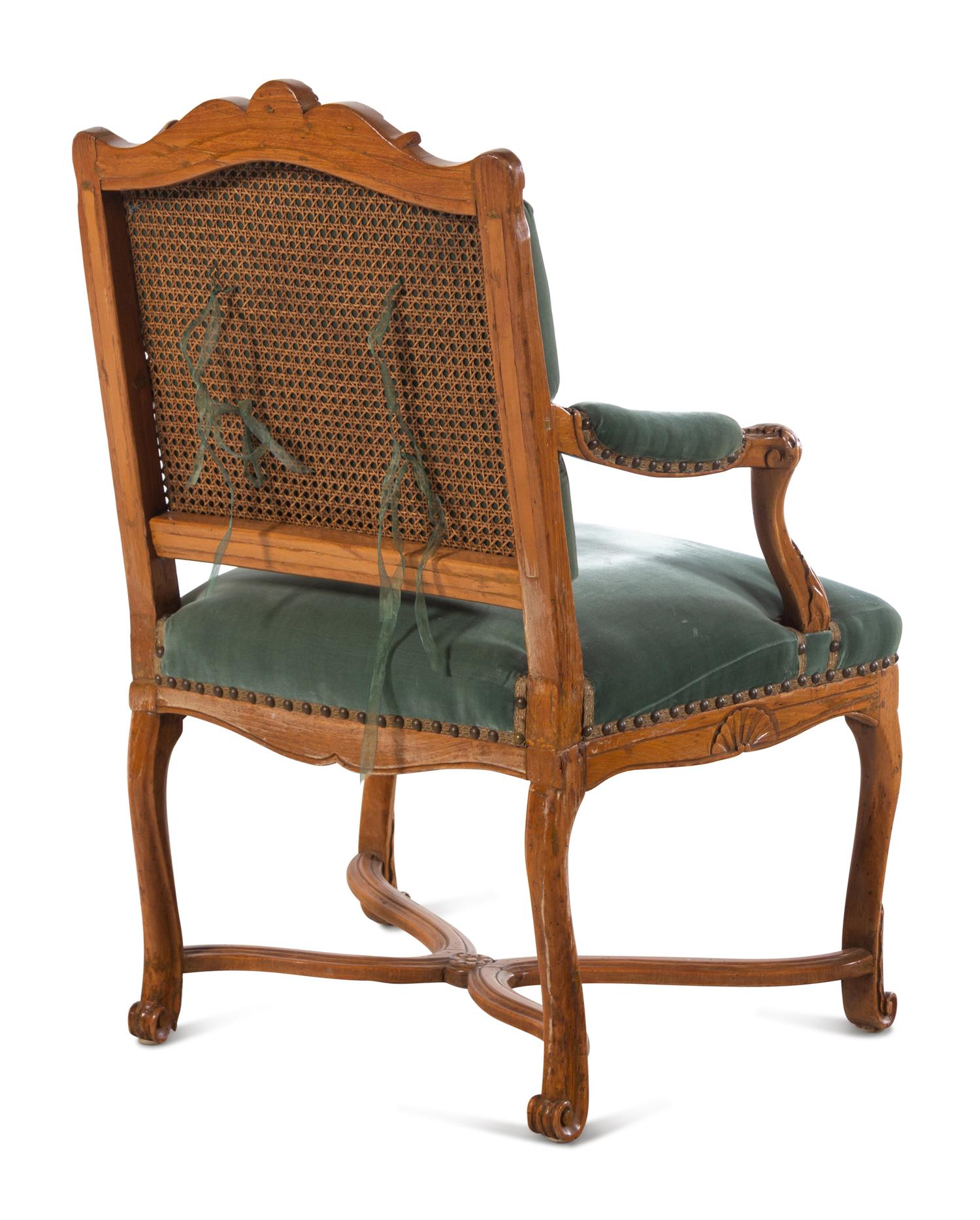 A Régence Style Velvet-Upholstered Beechwood Fauteuil