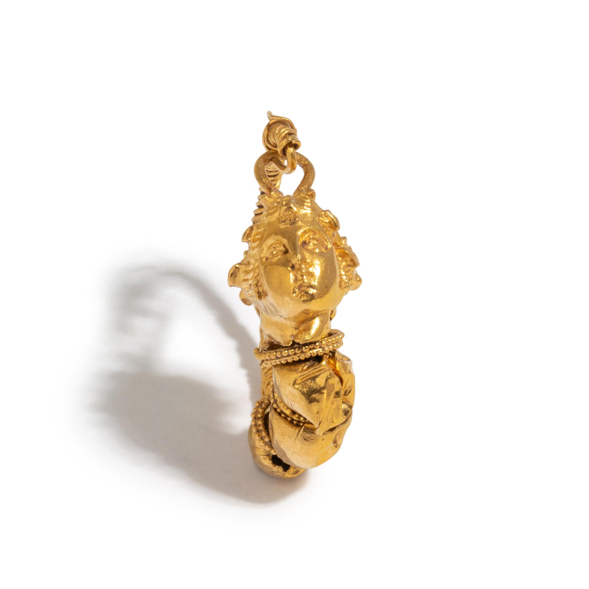 A Greek Gold Earring with the Head of a Maenad