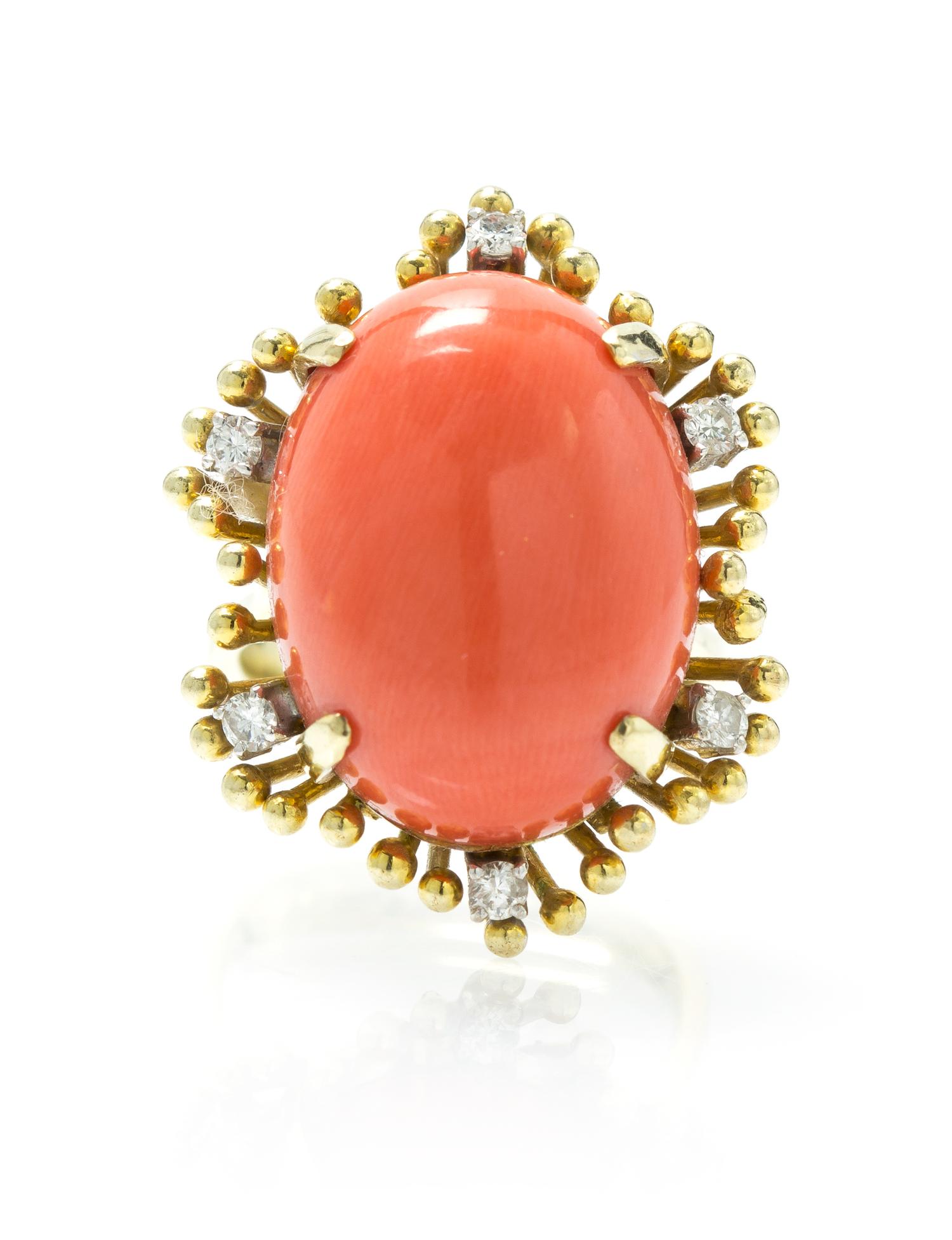 A 14 Karat Yellow Gold, Coral and Diamond Ring, 7.45 dwts.
